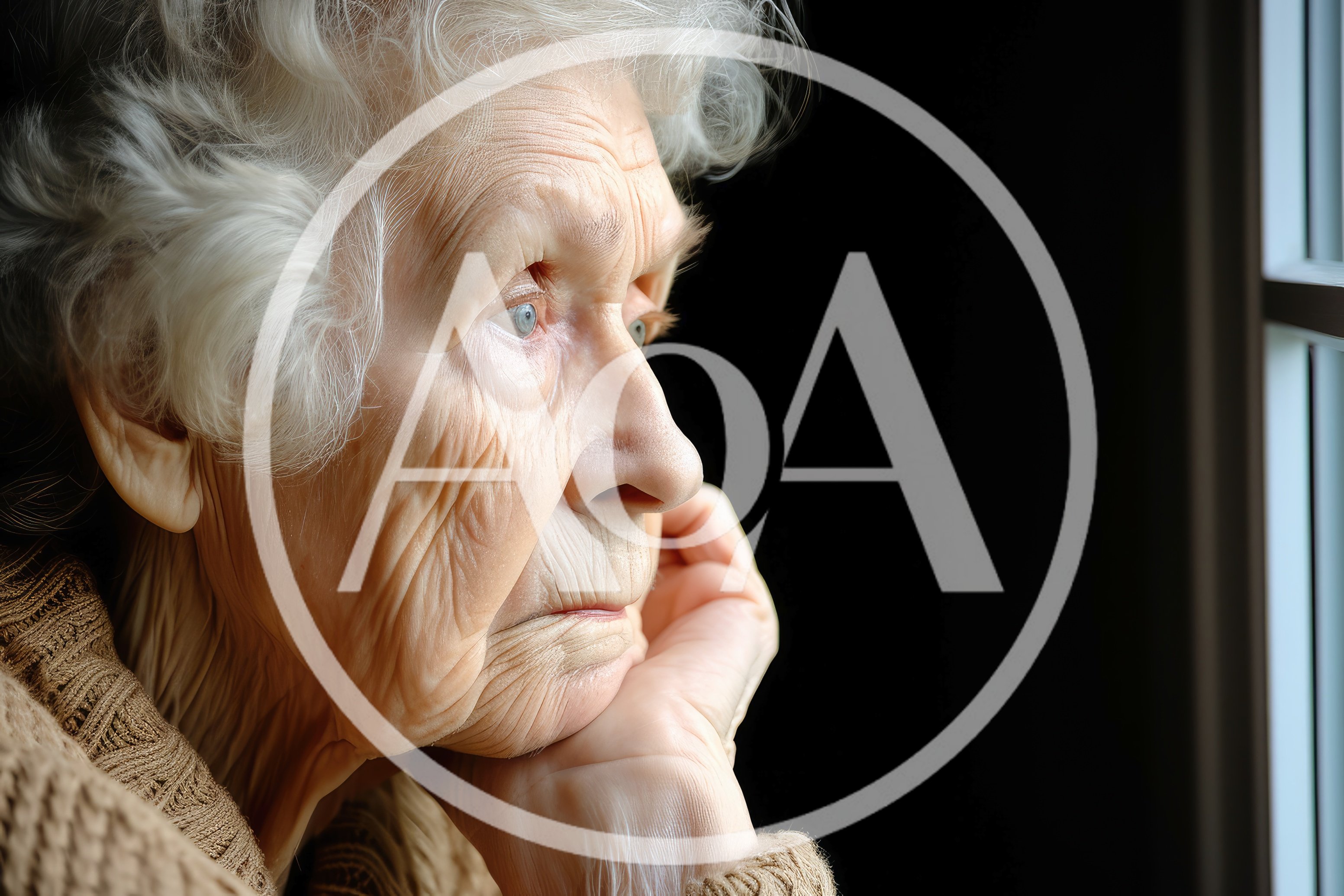 Elderly Woman Looking Out A Window
