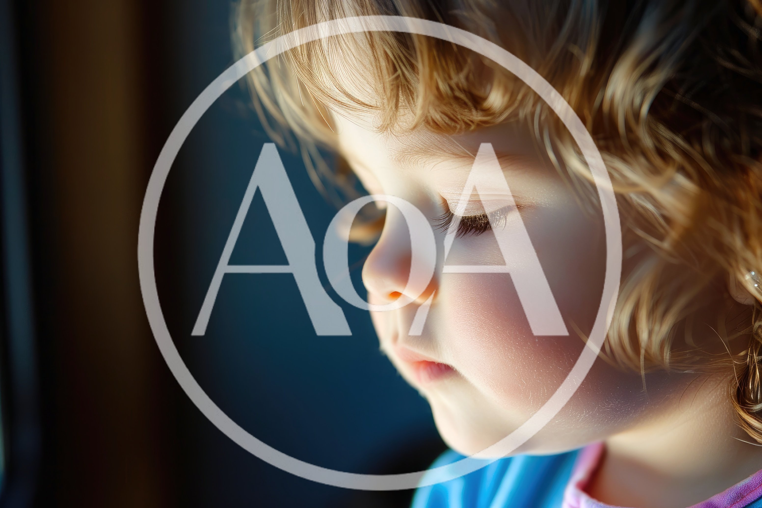 Close Up Portrait Of A Young Child Looking Down