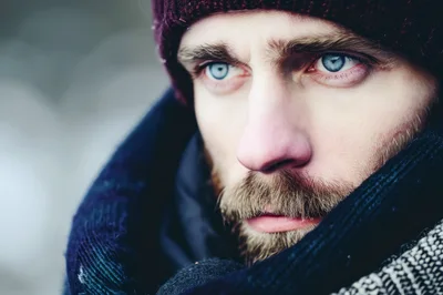 Close Up Portrait Of A Man In Winter Clothing