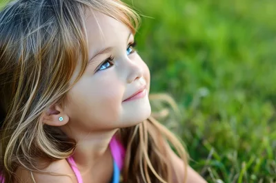 Portrait Of A Young Girl Looking Upwards