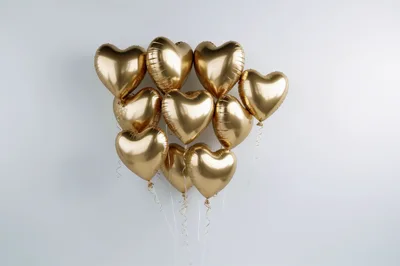 Bunch Of Shiny Gold Heart Shaped Balloons