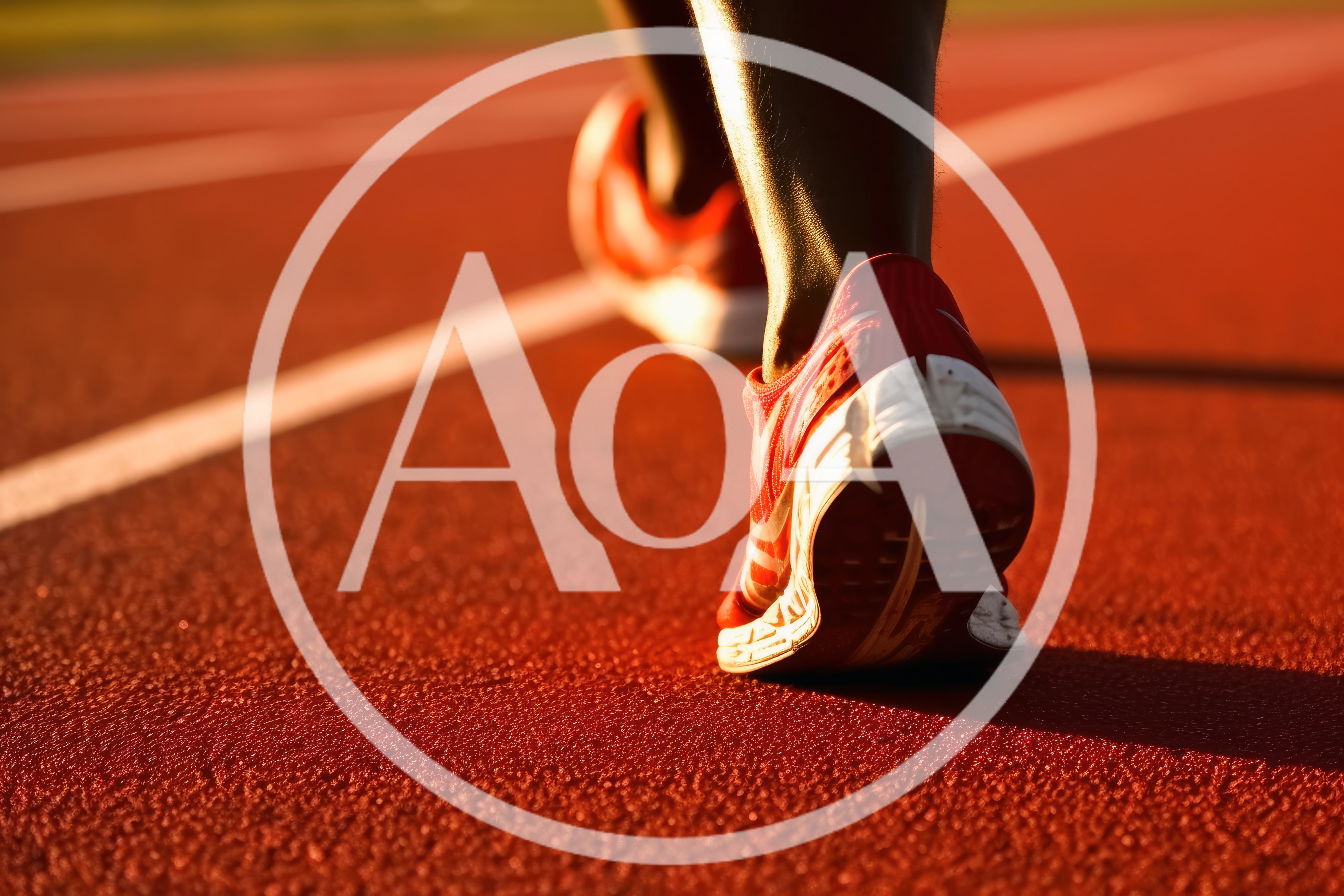 Runner Feet In Red Sneakers On Running Track