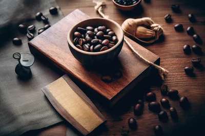 Coffee Beans In A Wooden Bowl On A Table