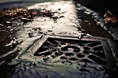 Close Up Of A Metal Storm Drain Grate