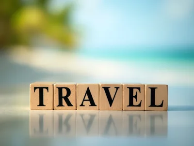 Wooden Blocks Spelling Travel on a Tropical Beach