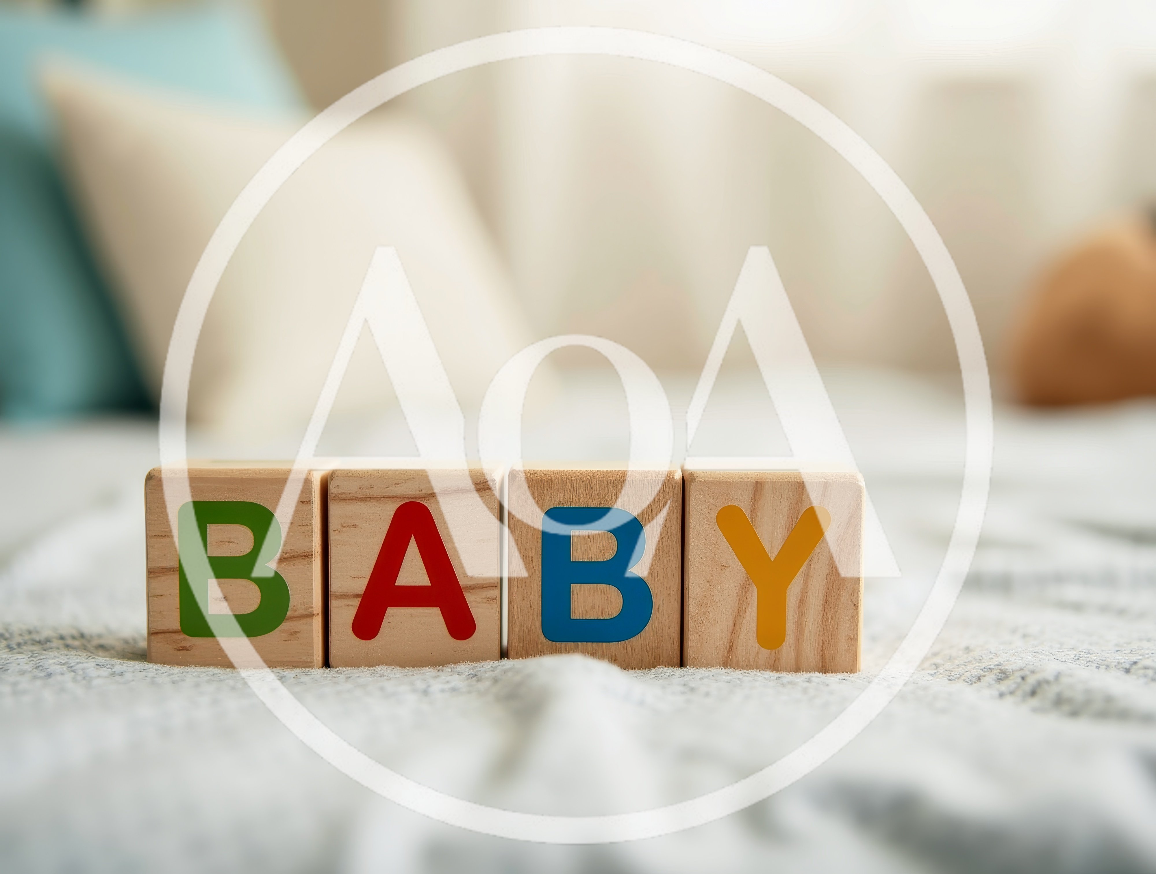 Wooden Baby Blocks Spelling Baby On A Soft Blanket