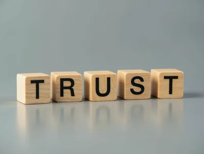 Wooden Blocks Spelling The Word Trust
