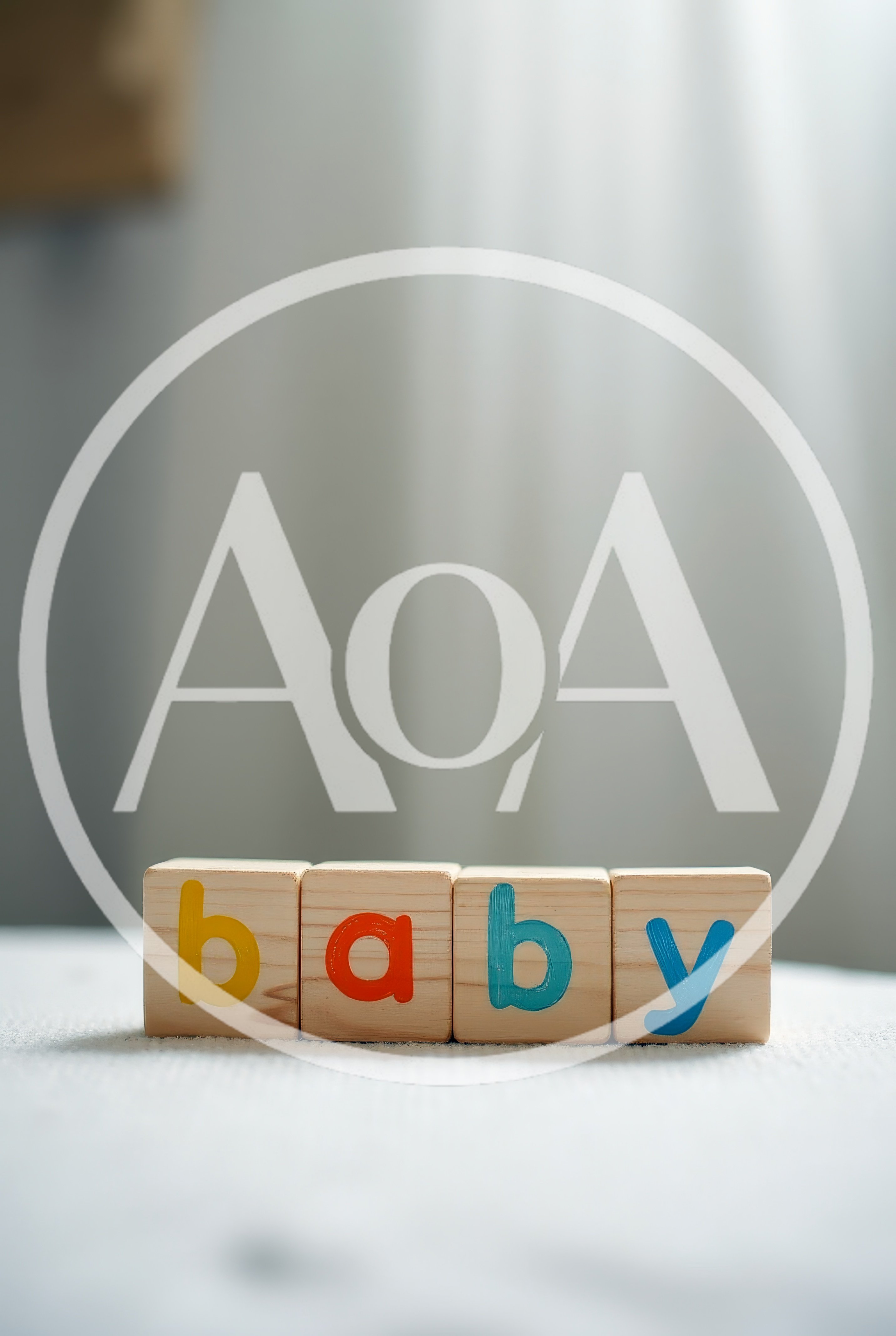 Wooden Blocks Spelling Baby On A Soft Surface