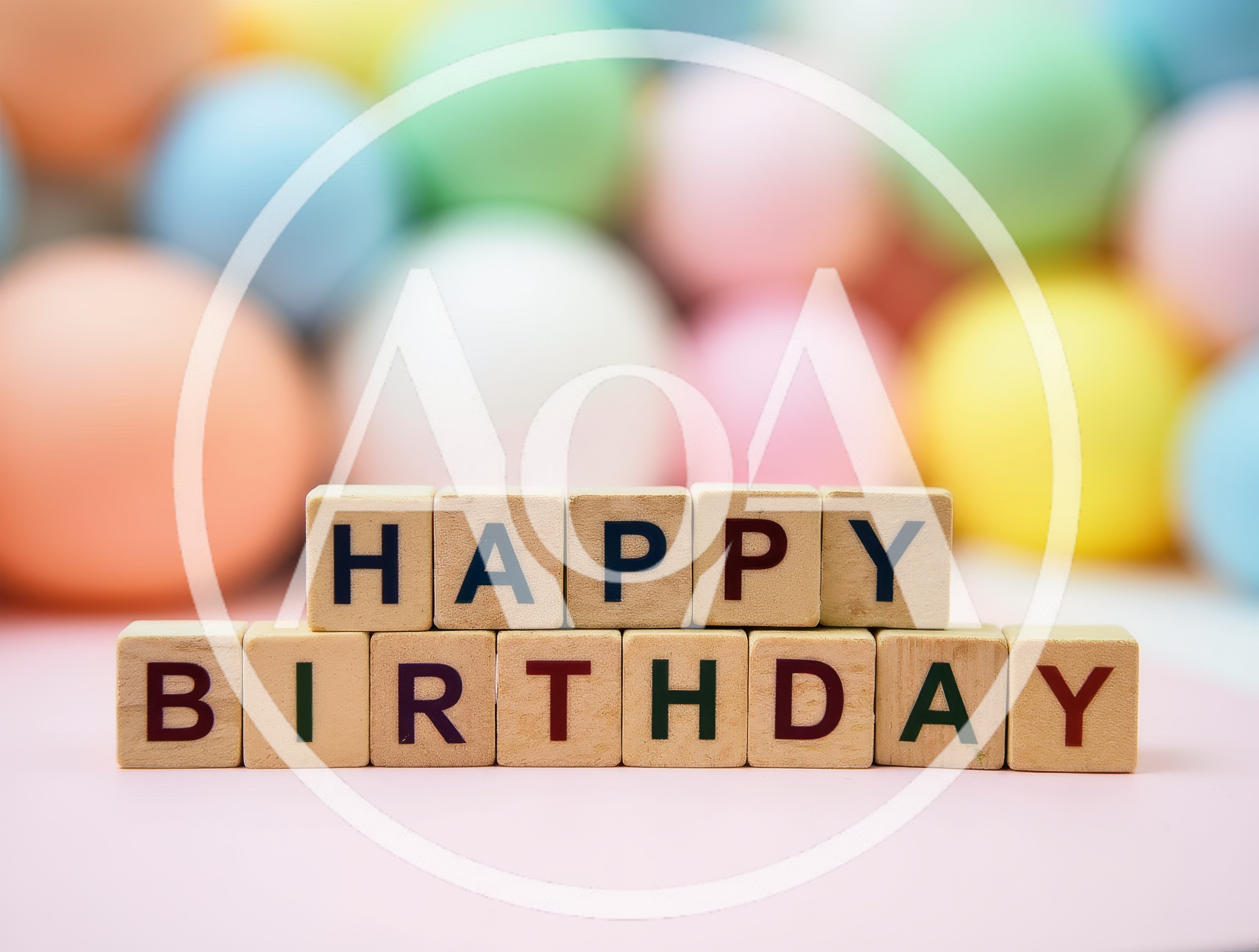 Happy Birthday Wooden Blocks on Pastel Background