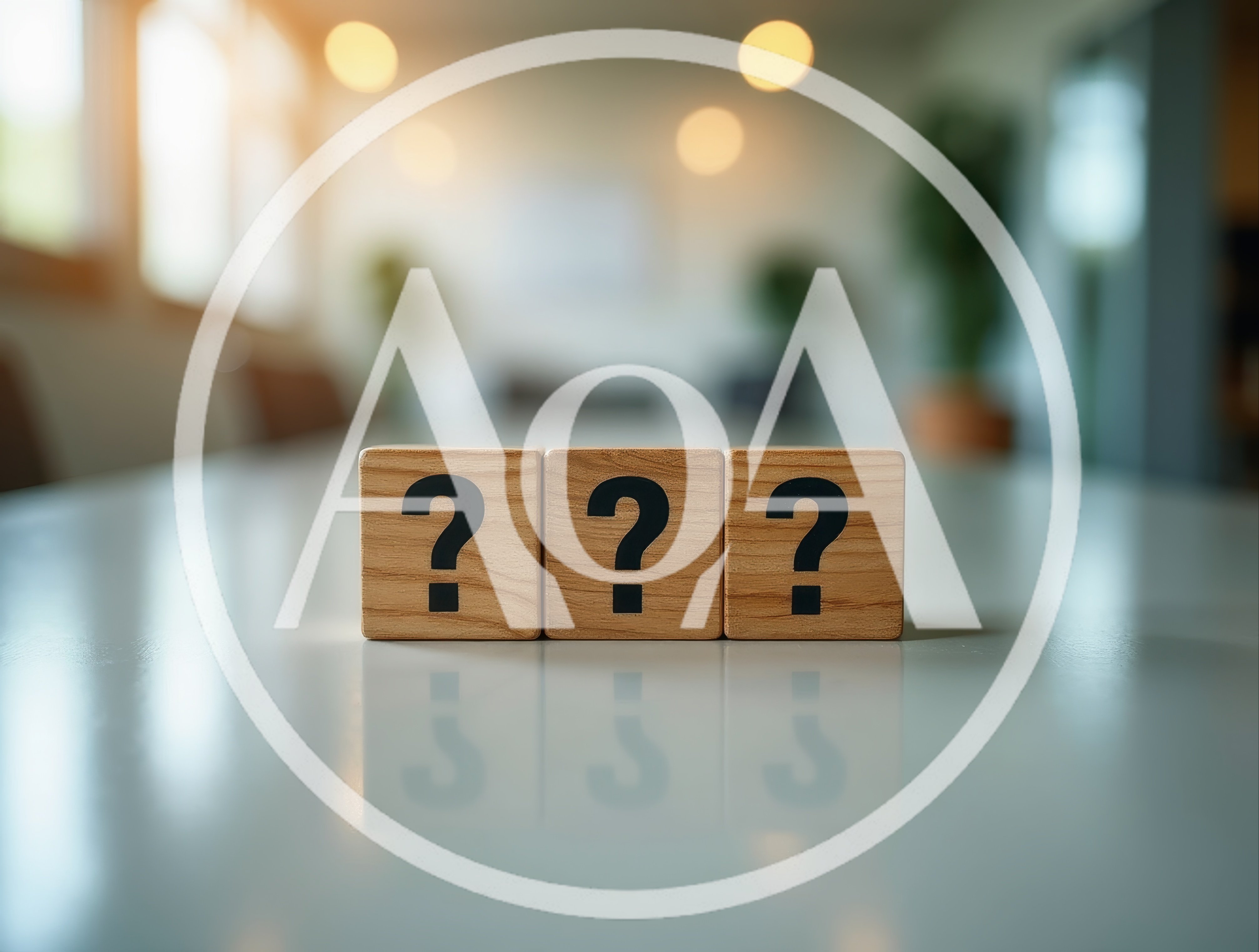 Three Wooden Blocks With Question Marks On Table