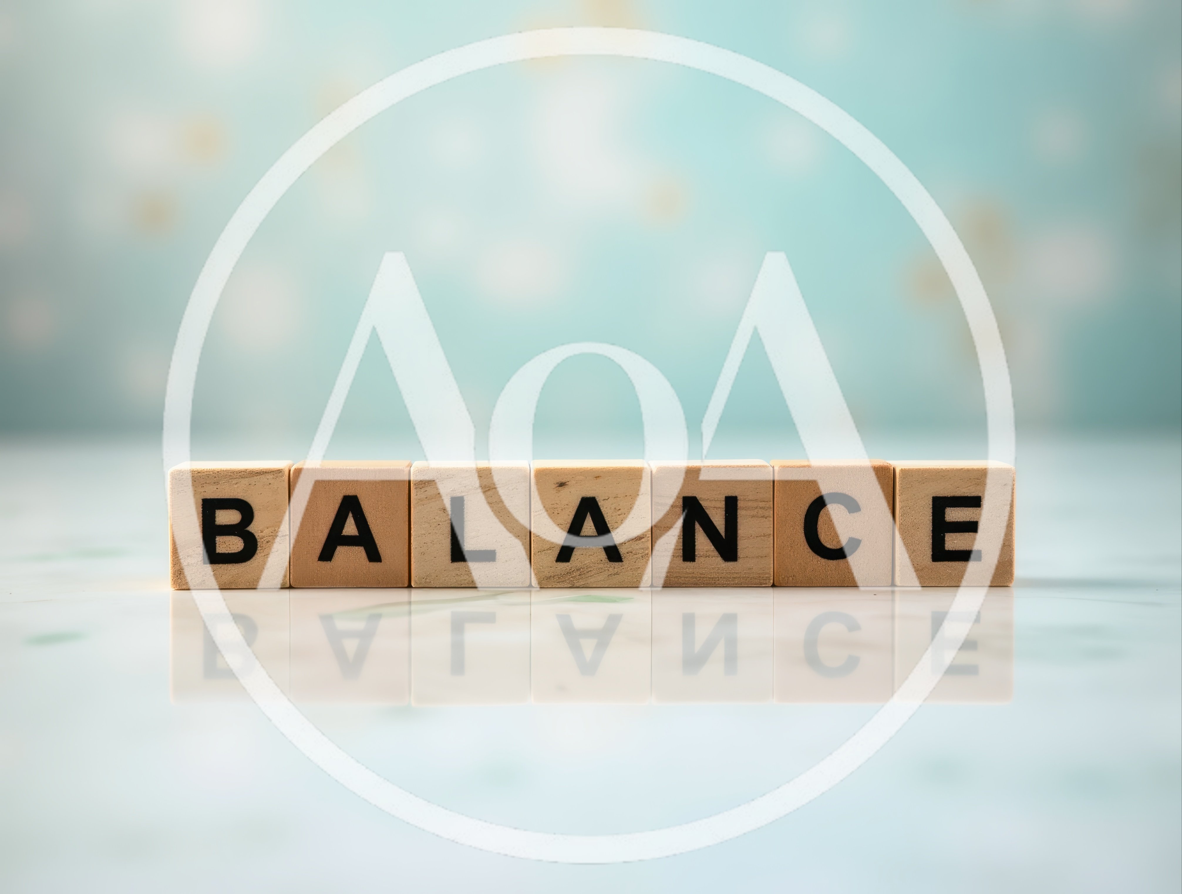 Wooden Blocks Spelling Balance On Reflective Surface