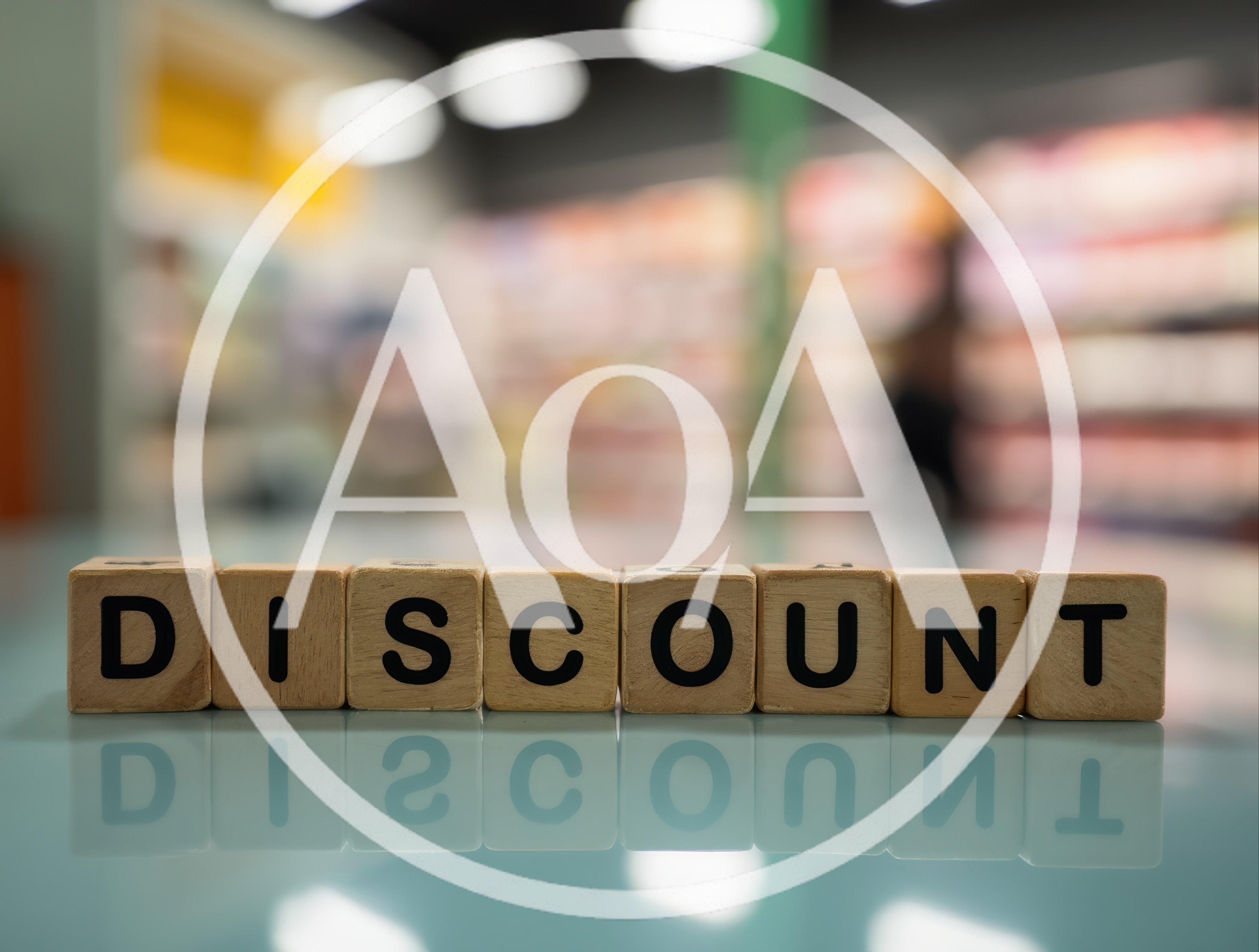 Wooden Blocks Spelling Discount on Reflective Surface