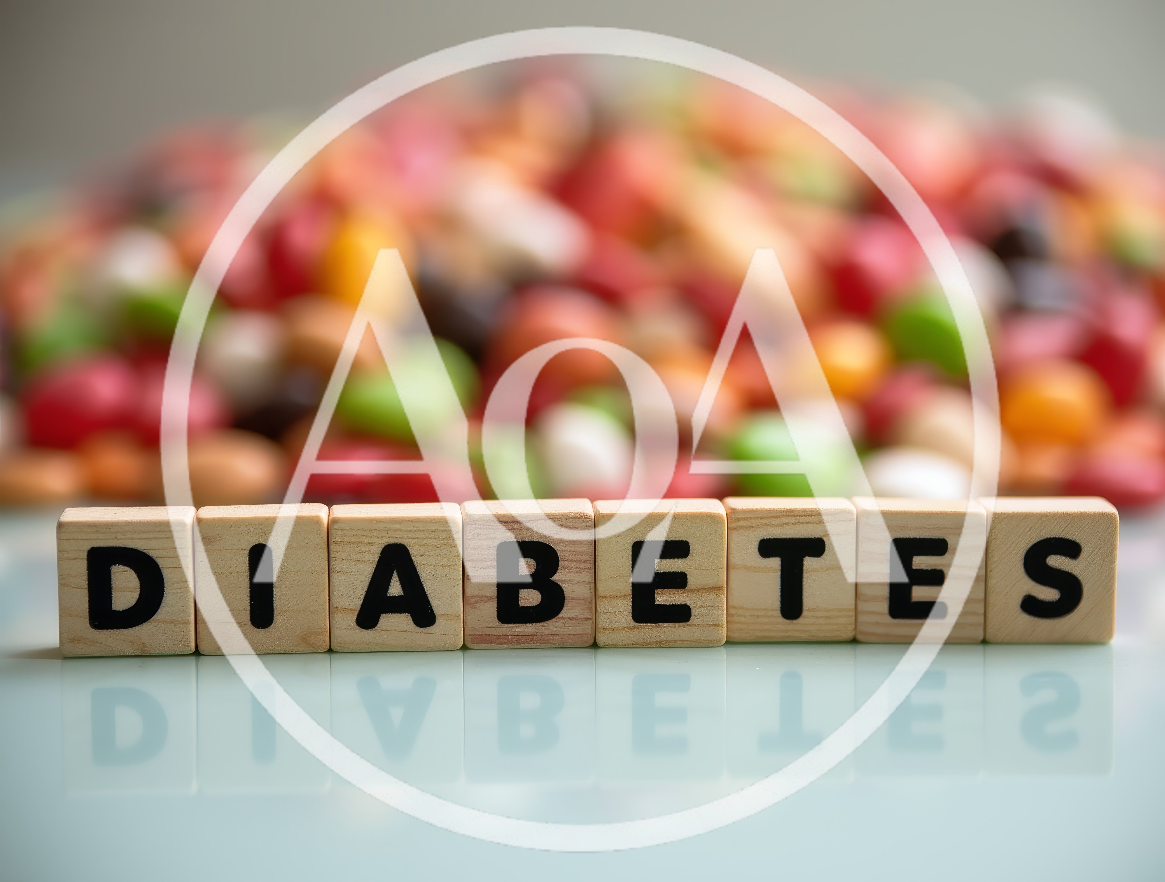 Wooden Blocks Spelling Diabetes With Blurred Candy Background