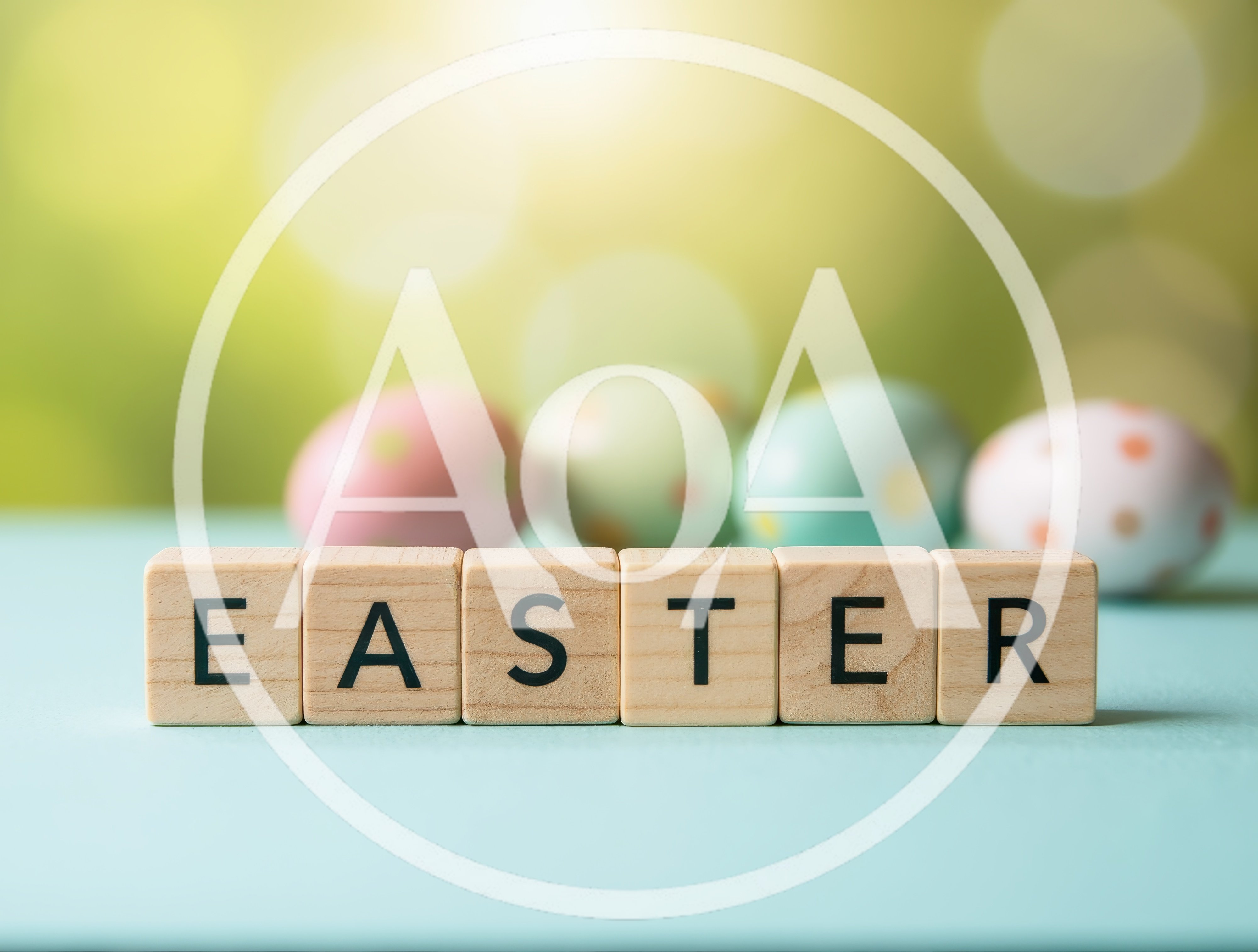 Wooden Blocks Spelling Easter with Colorful Eggs