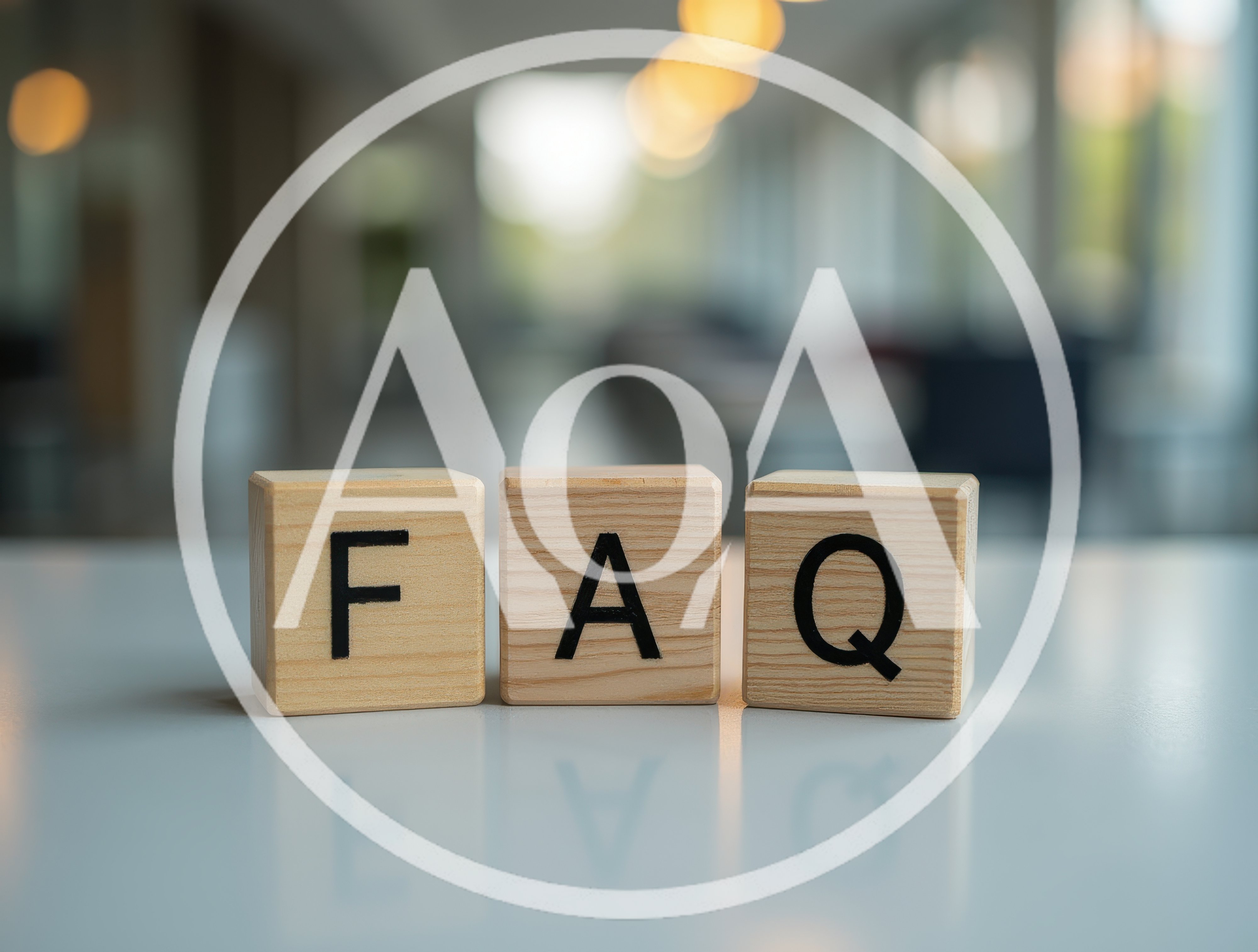 Wooden Blocks Spelling FAQ On A Blurred Office Background