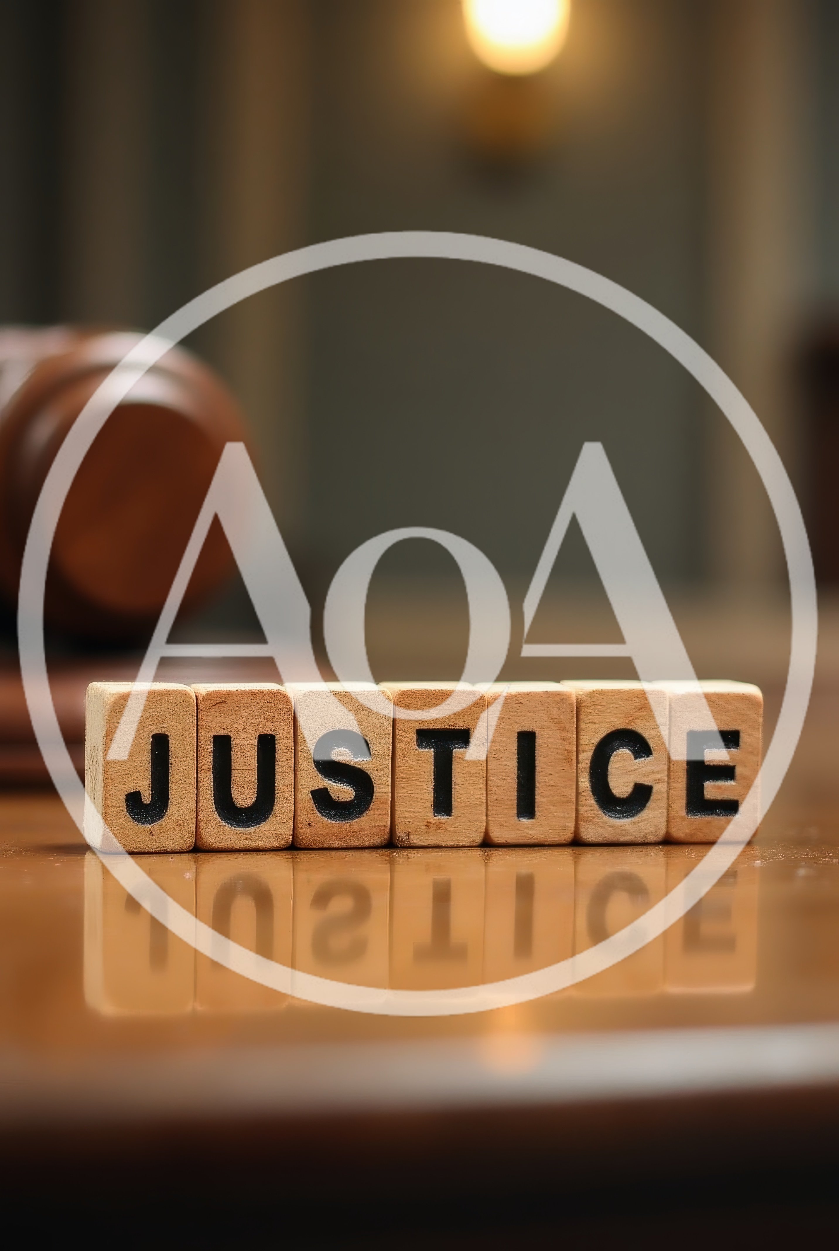 Wooden Blocks Spelling Justice With Gavel In Courtroom