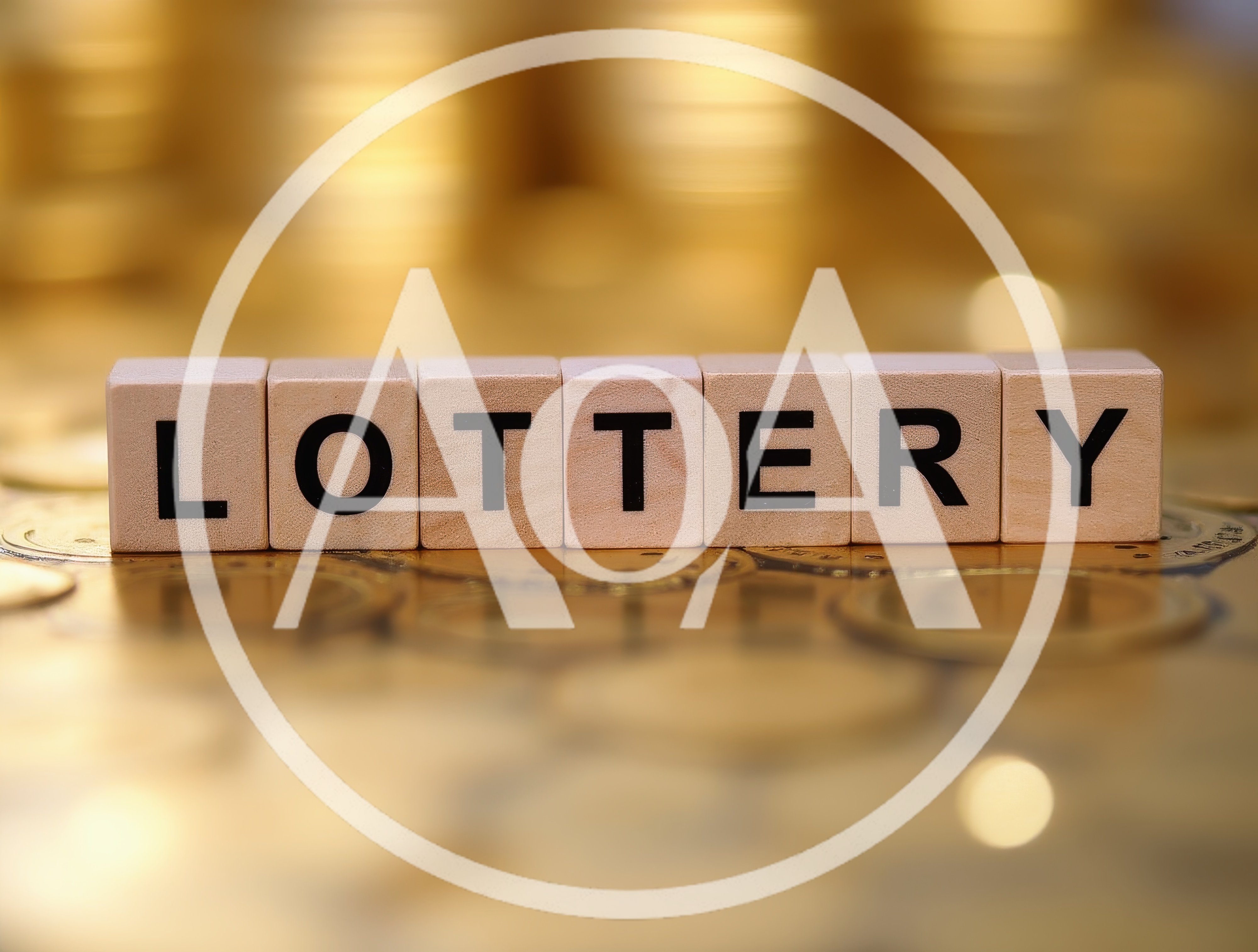 Wooden Blocks Spelling Lottery On A Pile Of Gold Coins