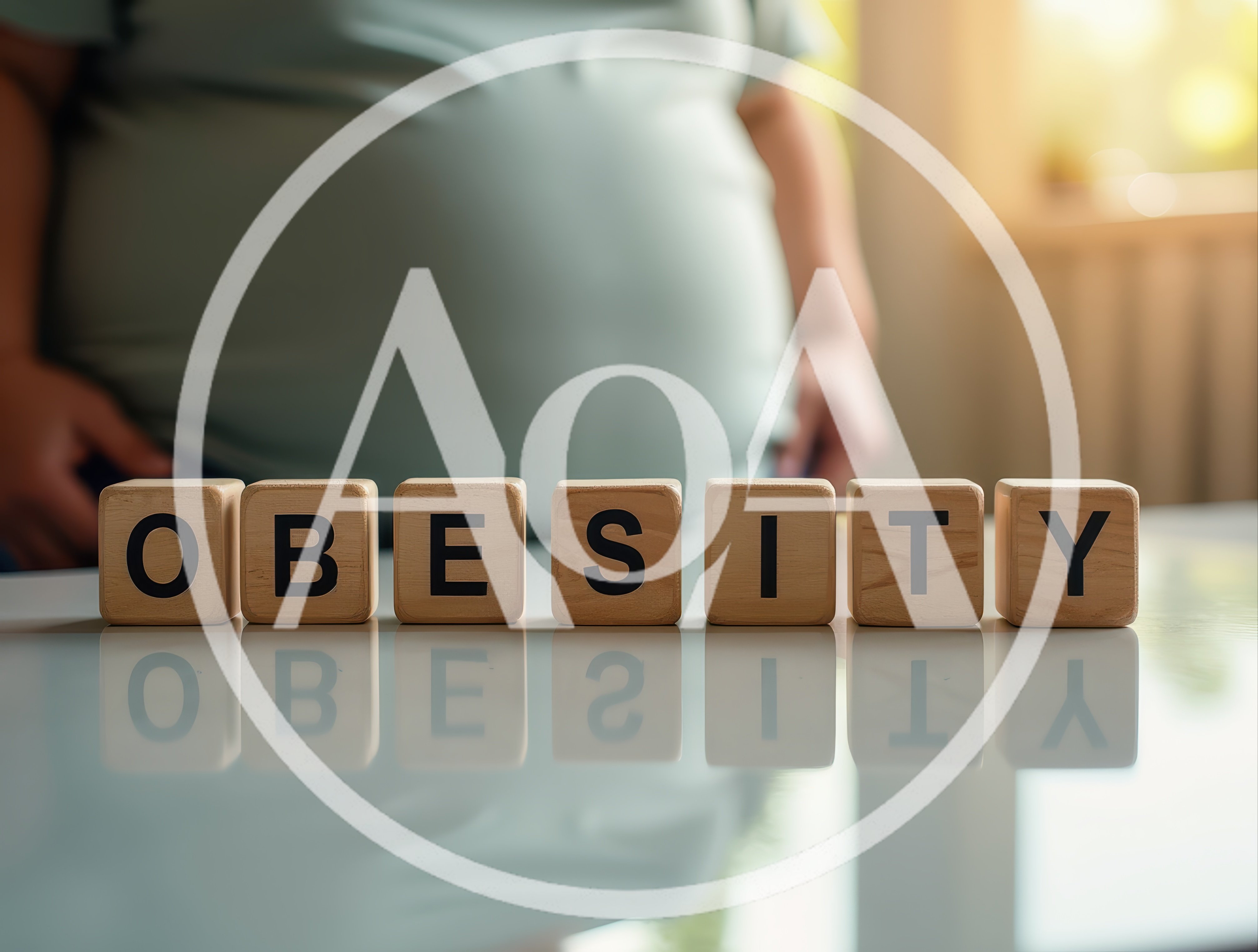 Wooden Blocks Spelling Obesity With Person In Background