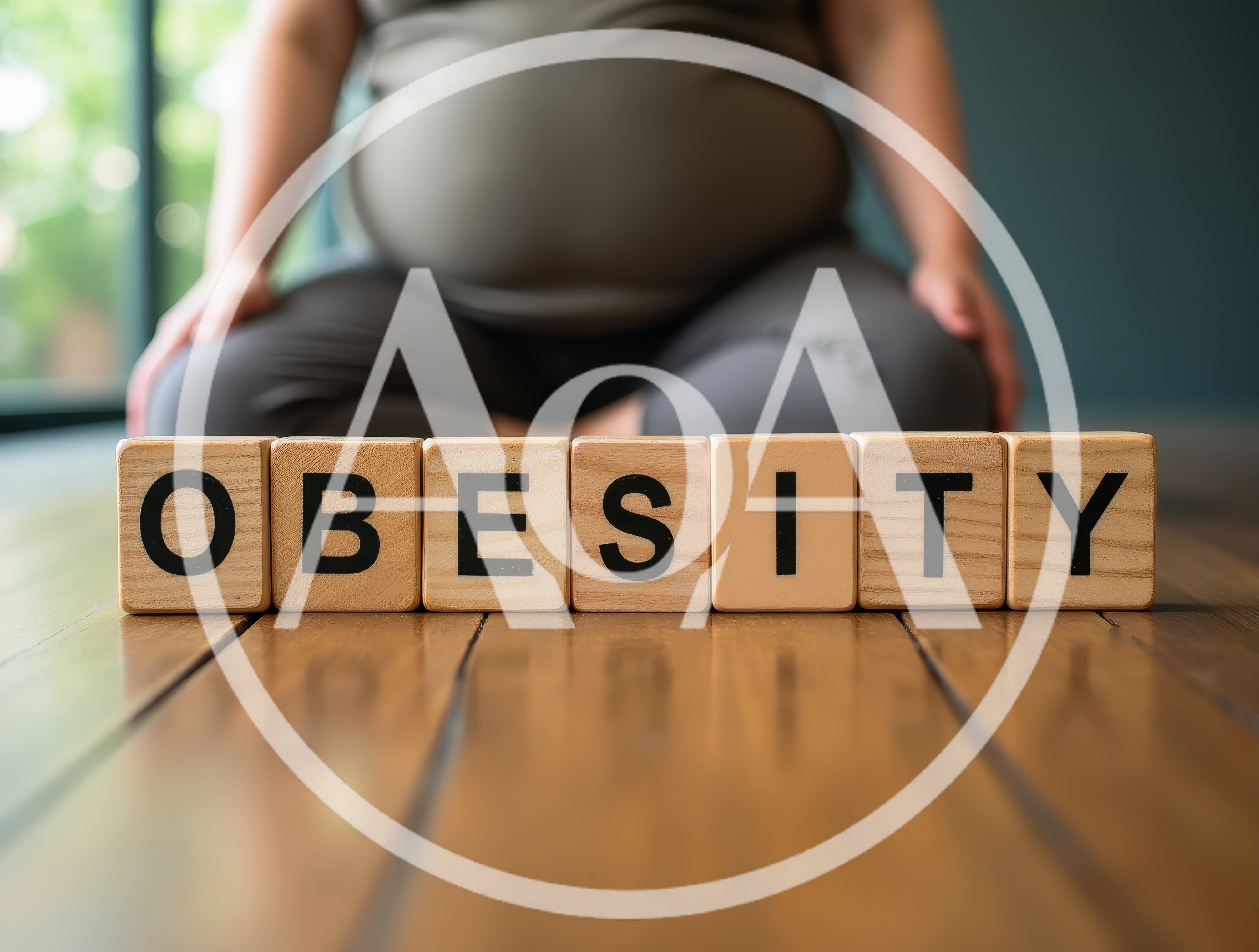 Wooden Blocks Spelling Obesity With Person In Background