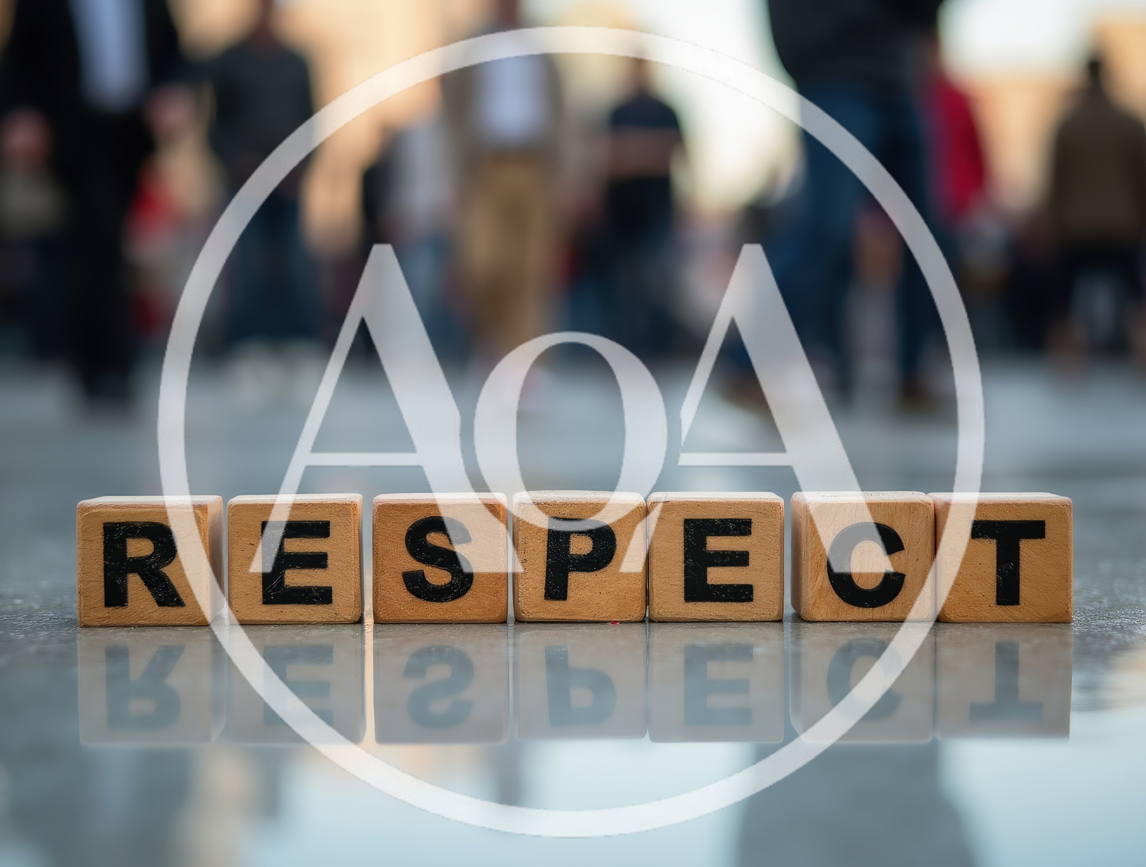 Wooden Blocks Spelling Respect On A Reflective Surface