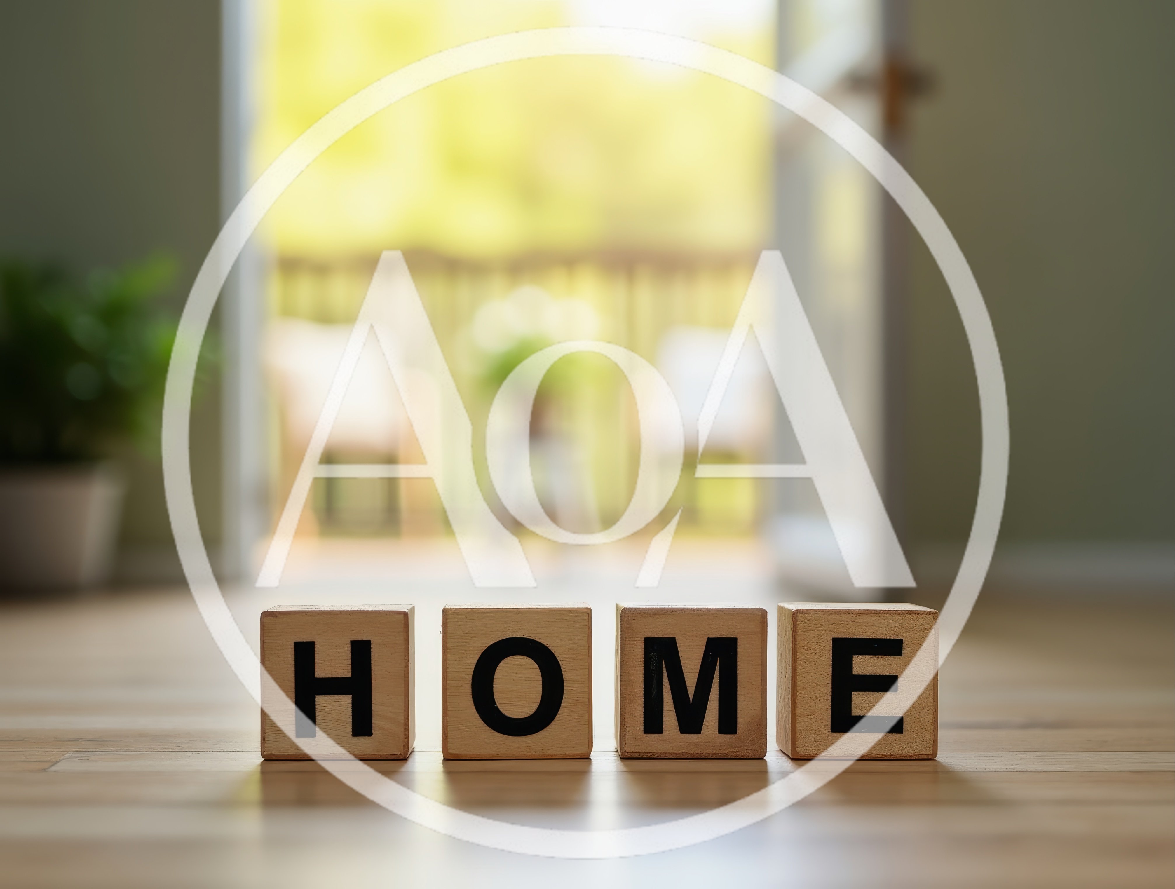 Wooden Blocks Spelling Home on a Sunny Floor