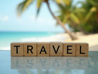 Wooden Blocks Spelling Travel on a Tropical Beach