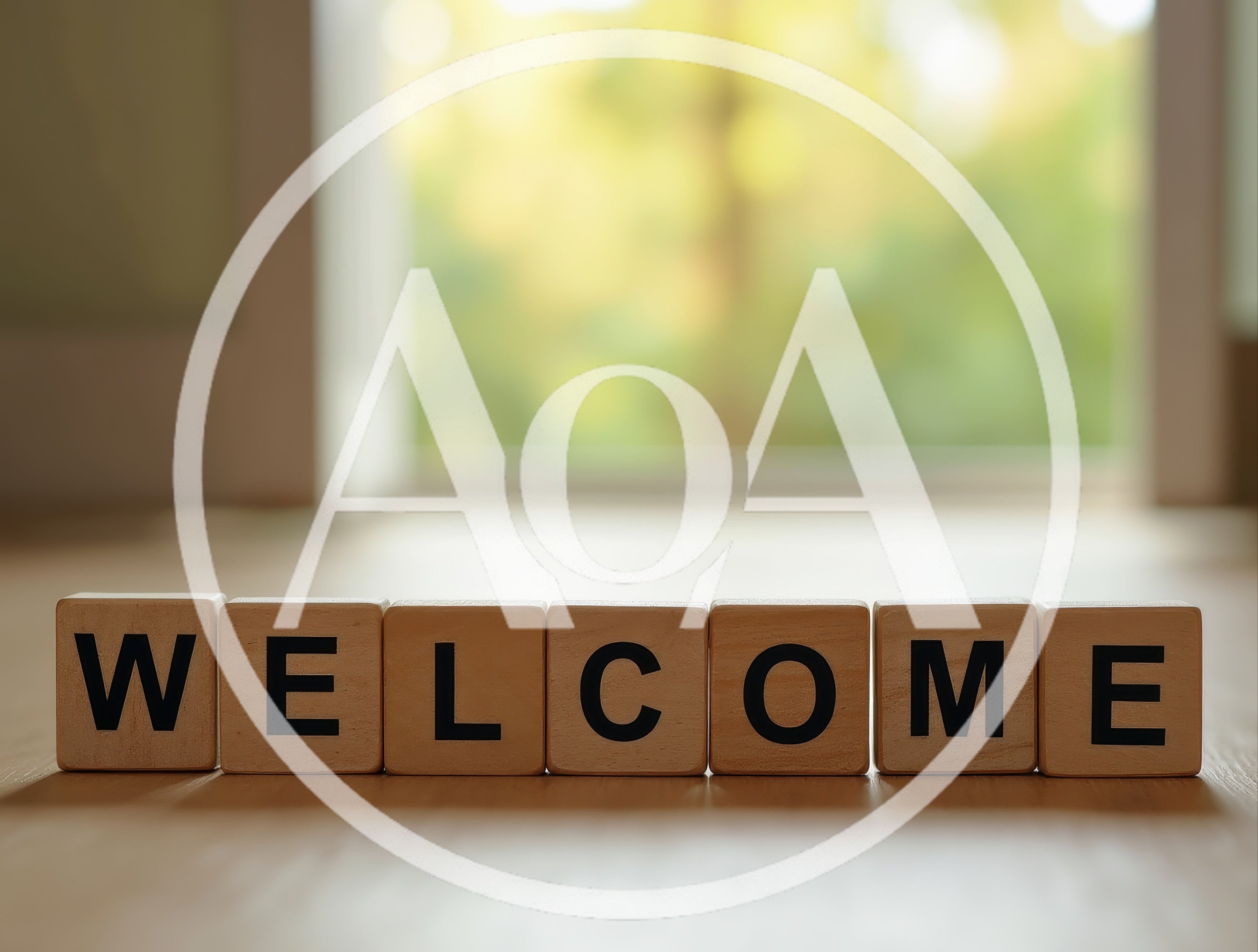Wooden Blocks Spelling Welcome On A Table