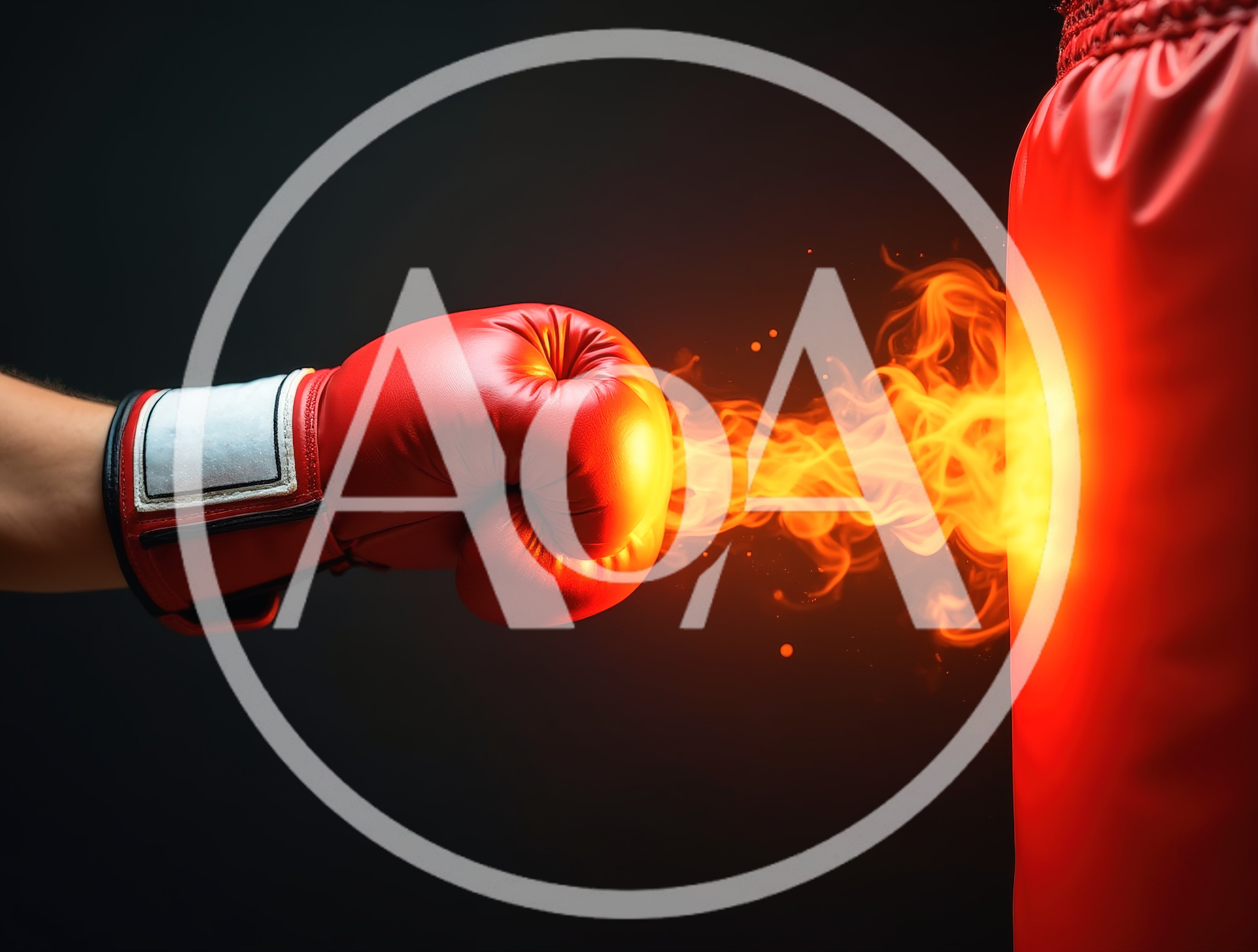 Red Boxing Glove Striking A Punching Bag With Fire