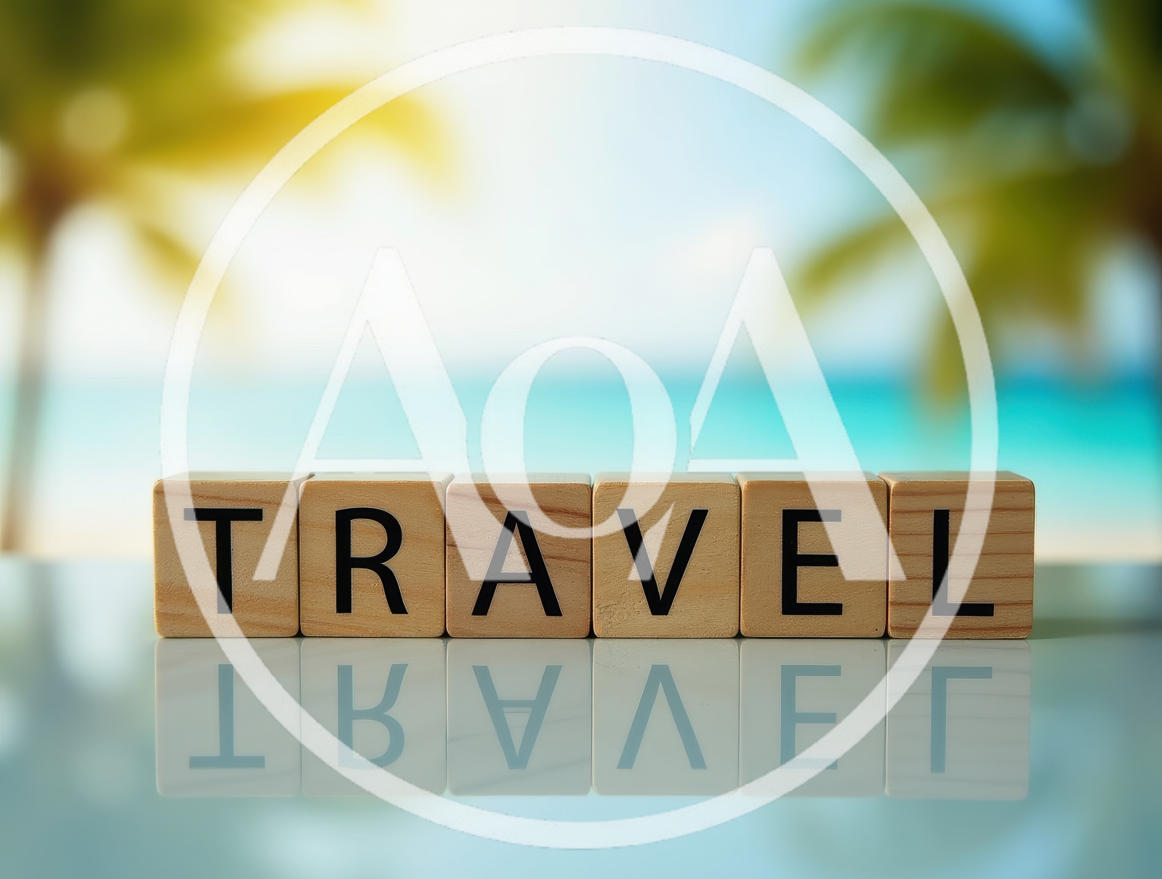 Wooden Blocks Spelling Travel on a Reflective Surface