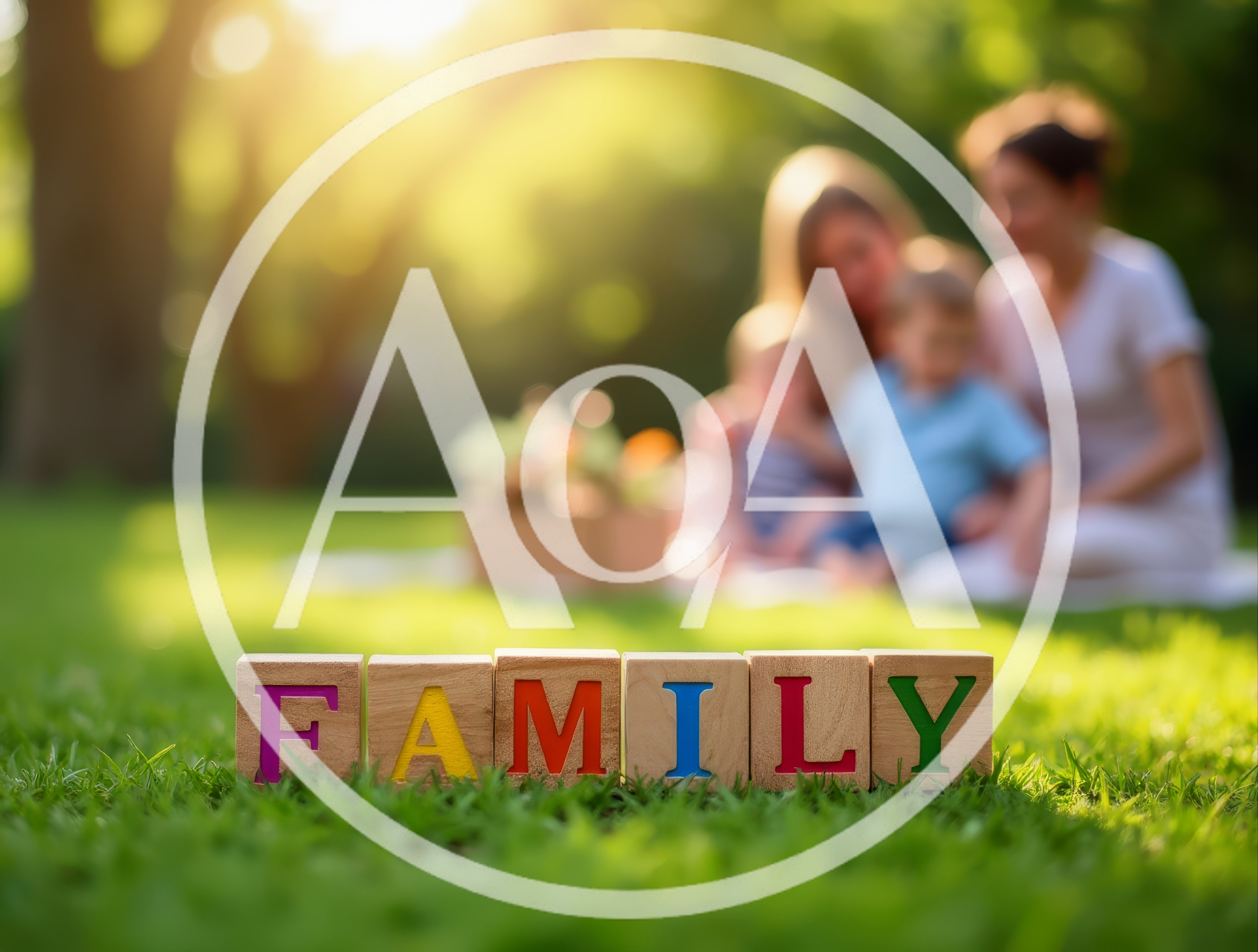 Wooden Blocks Spelling Family On Green Grass