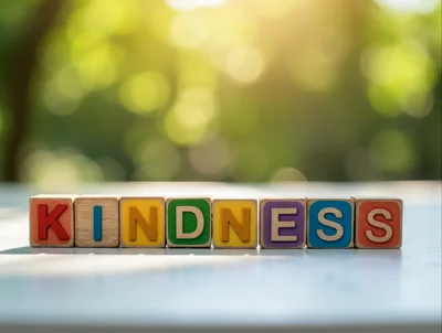 Wooden Alphabet Blocks Spelling The Word Kindness