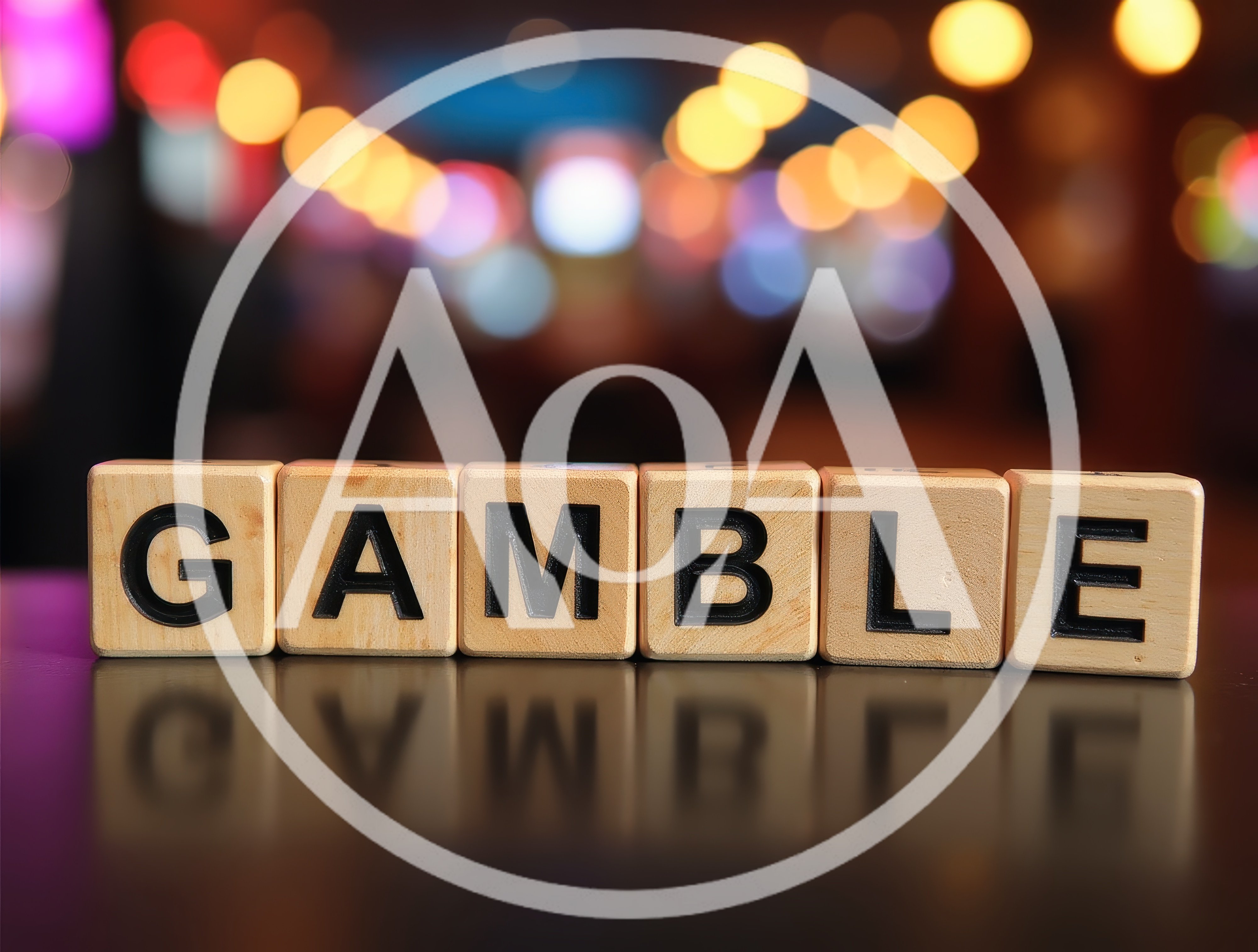 Wooden Blocks Spelling Gamble On Reflective Surface
