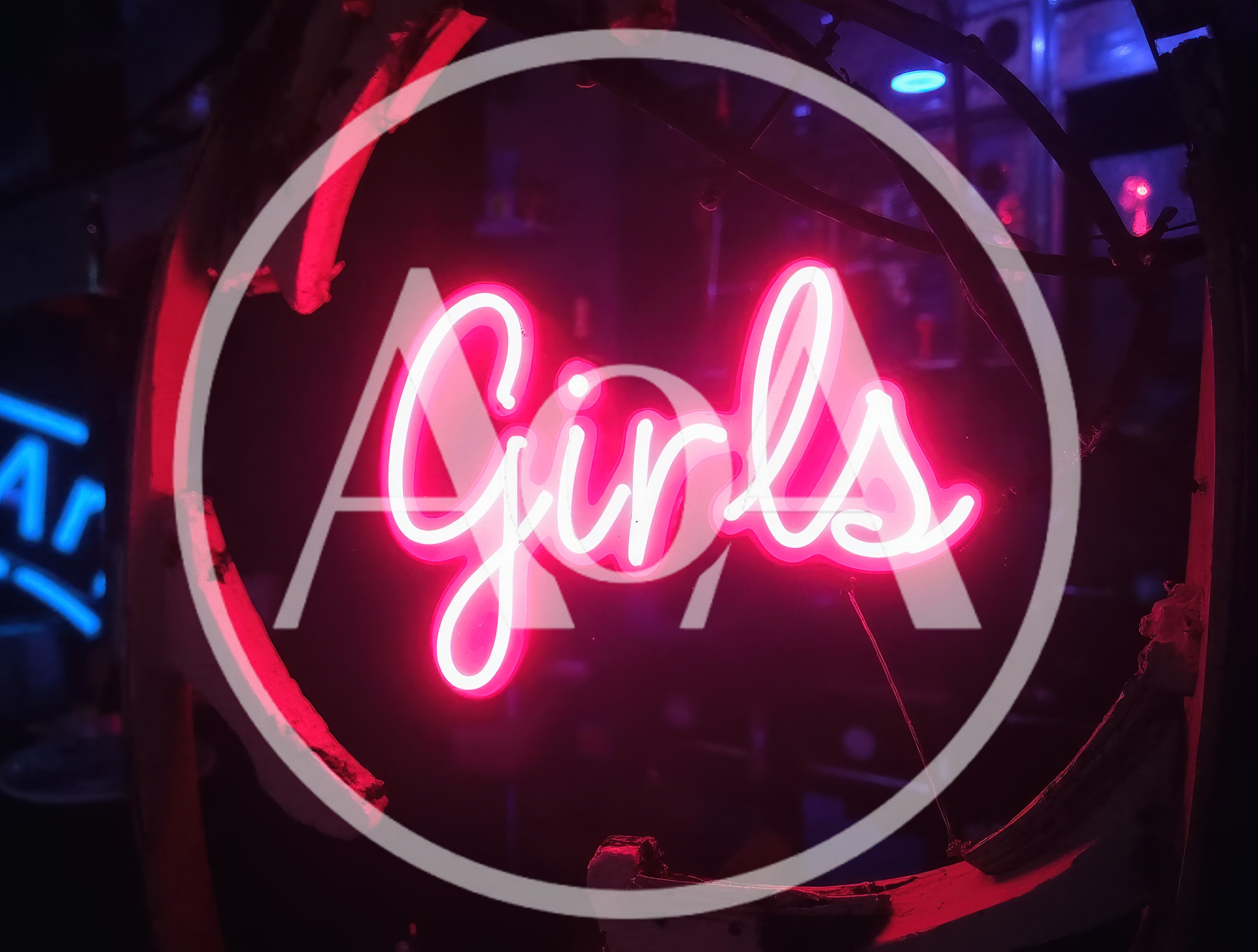 Bright Pink Neon Girls Sign In Dark Setting