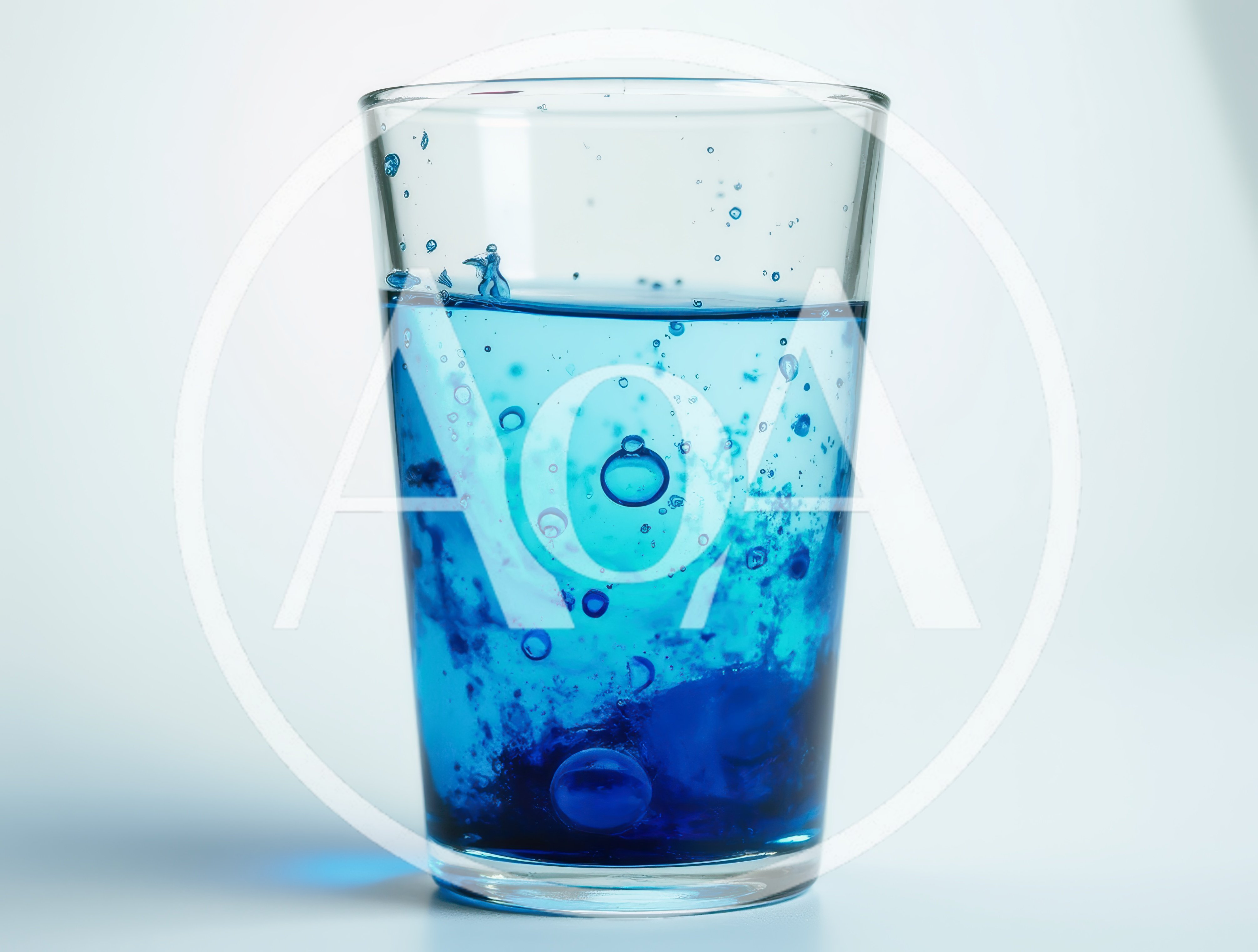 Blue Effervescent Tablet Dissolving In A Glass Of Water