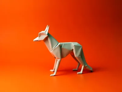Origami Paper Wolf Figurine On Orange Background