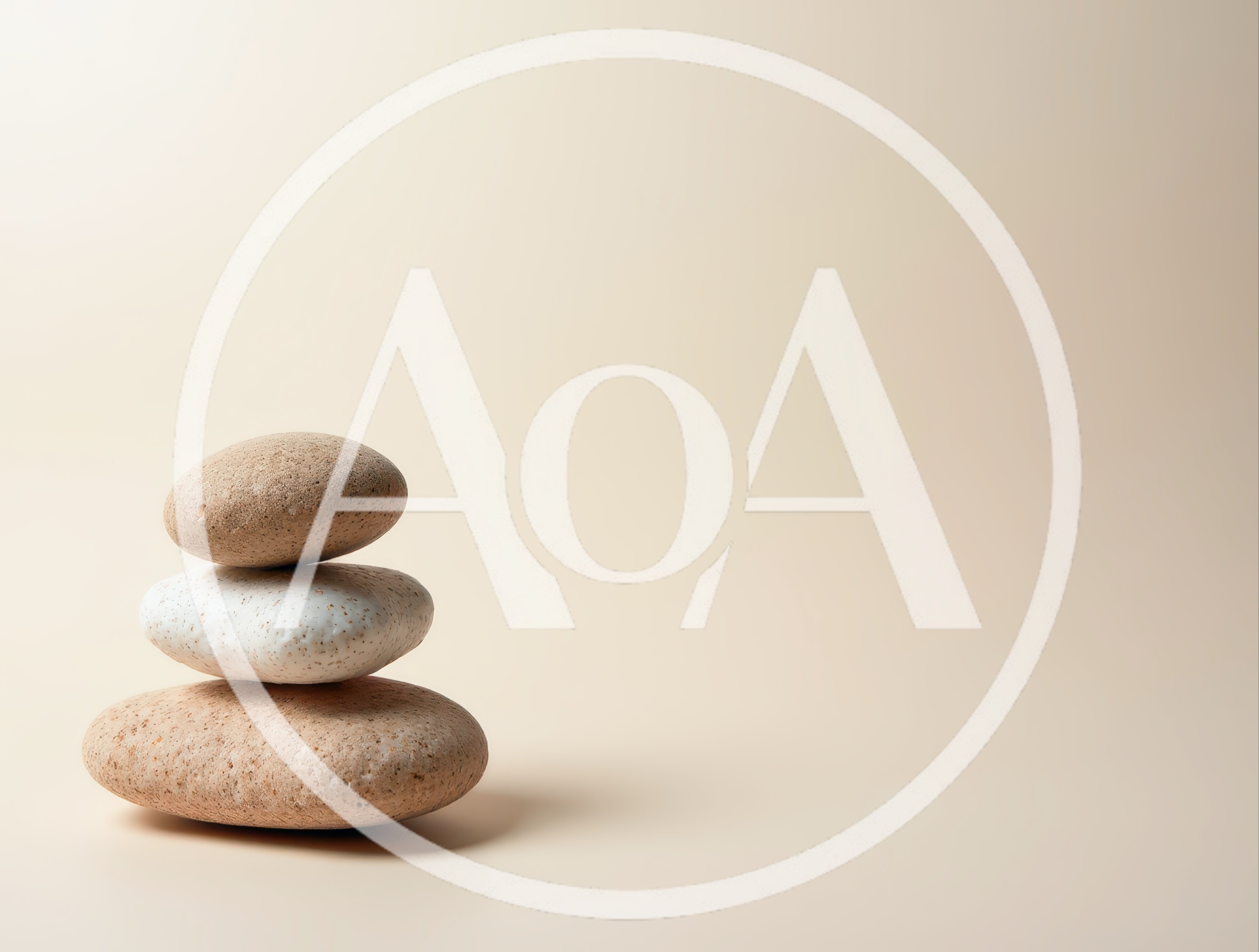 Stacked Smooth Stones On A Beige Background
