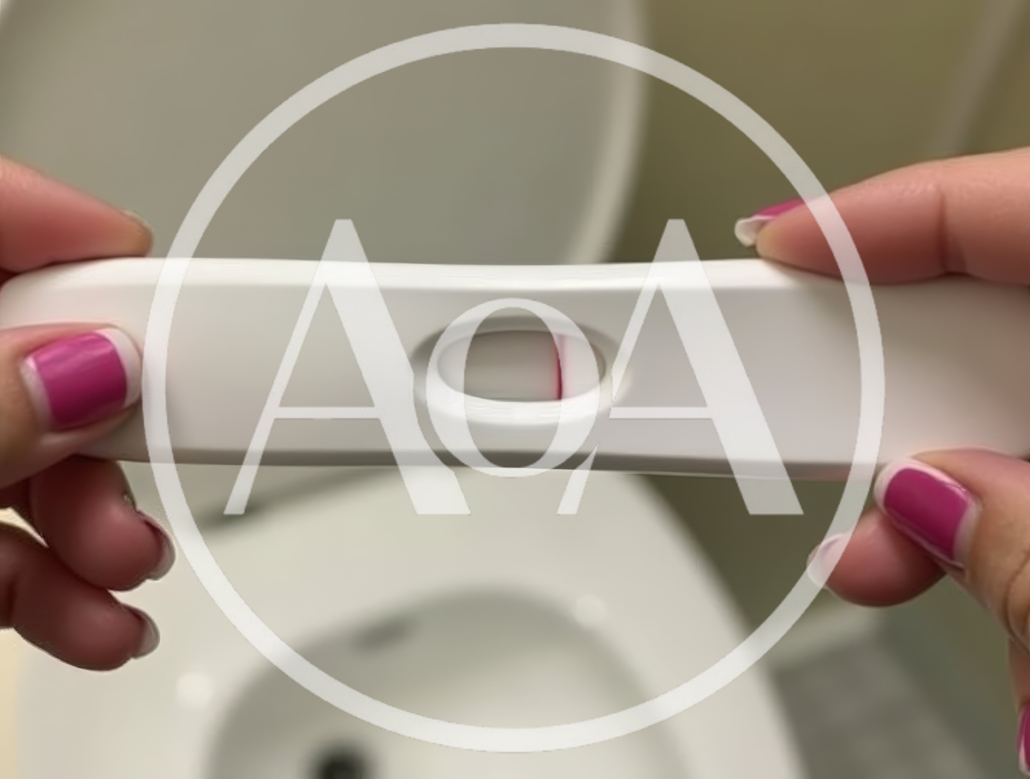 Woman Holding A Single Line Pregnancy Test
