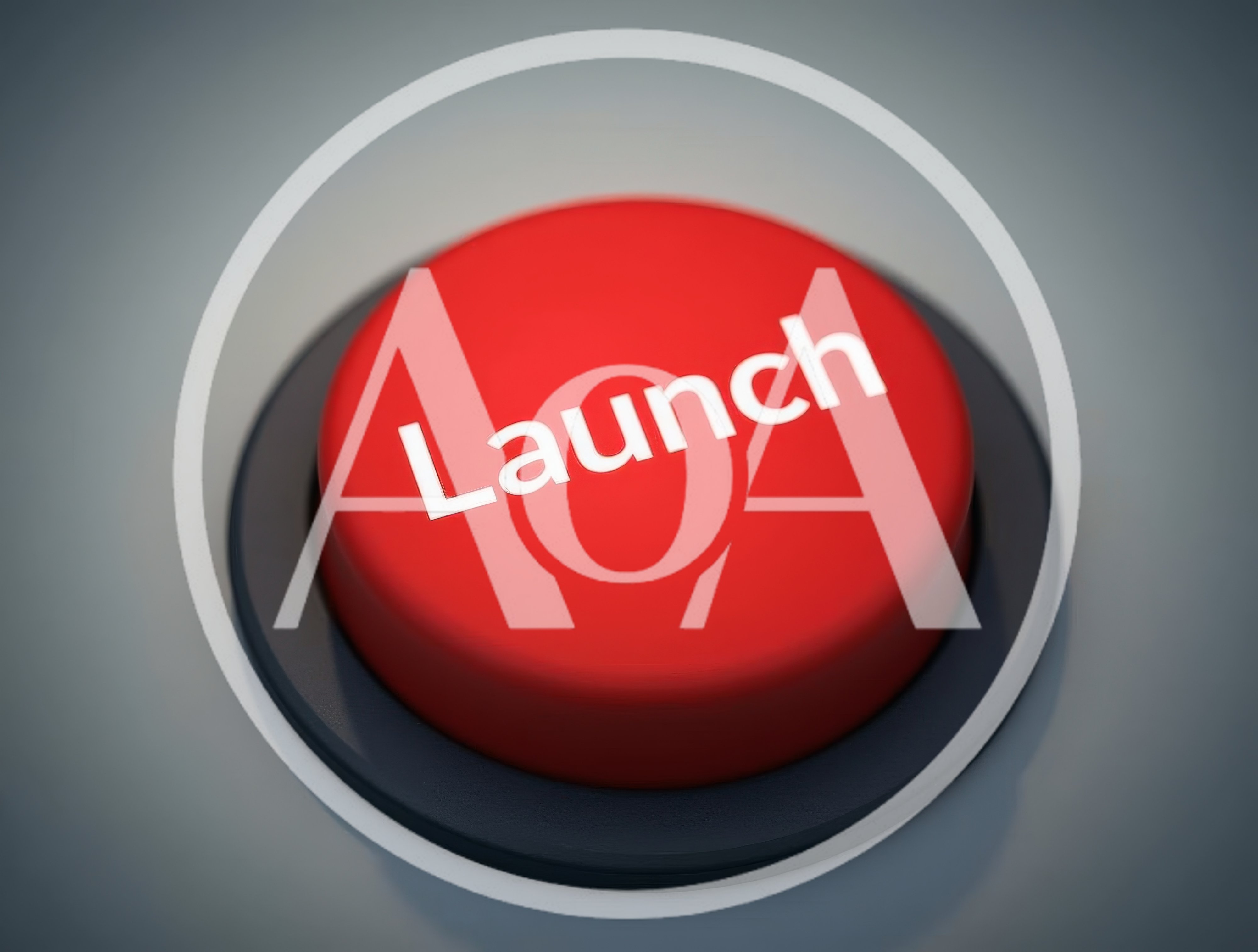 Red Launch Button On A Grey Surface
