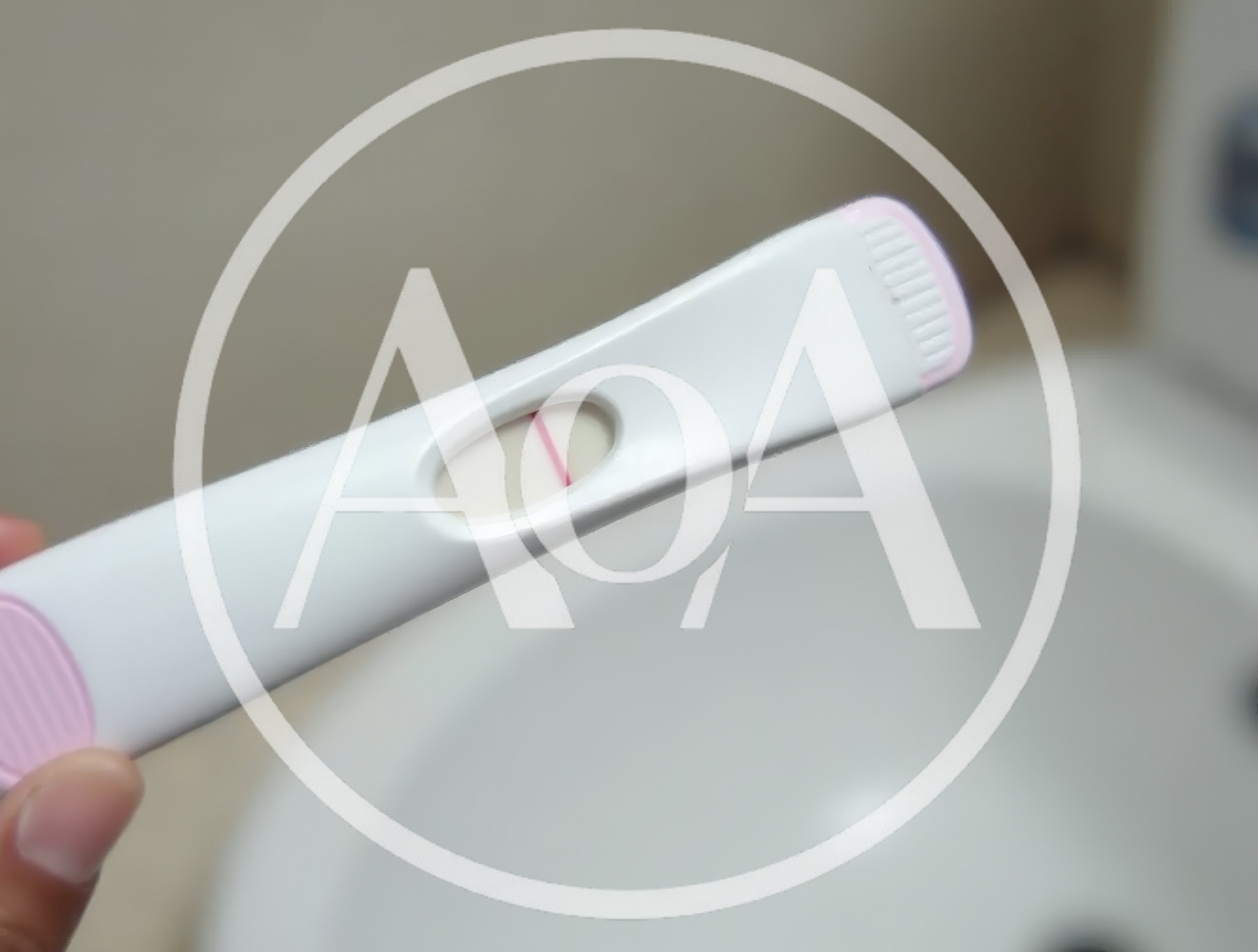 Hand Holding A Single Line Pregnancy Test