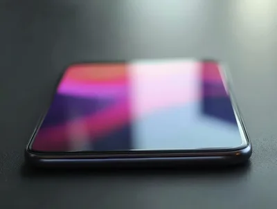Close Up Of A Modern Smartphone On Dark Surface