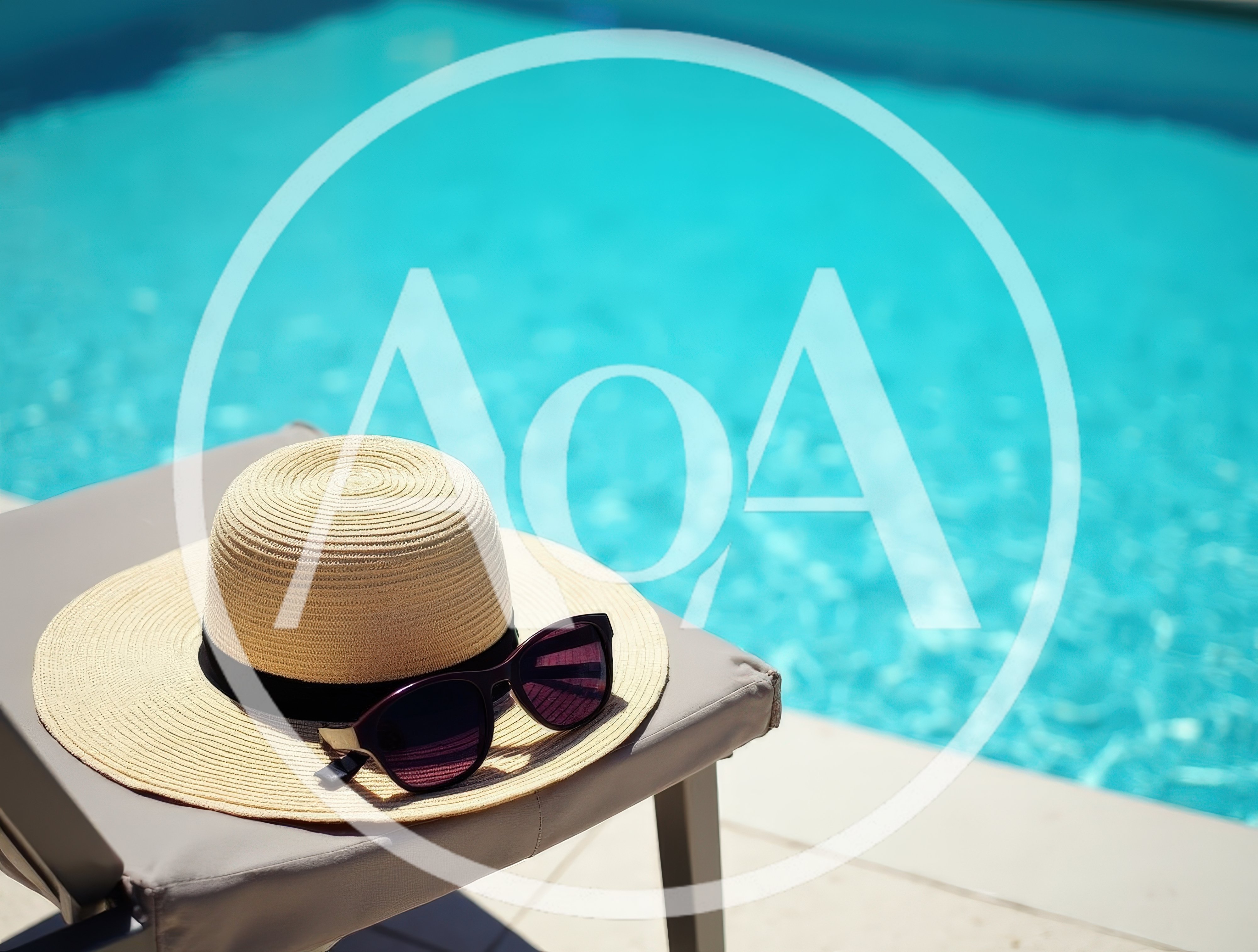 Straw Hat and Sunglasses on Poolside Lounge Chair