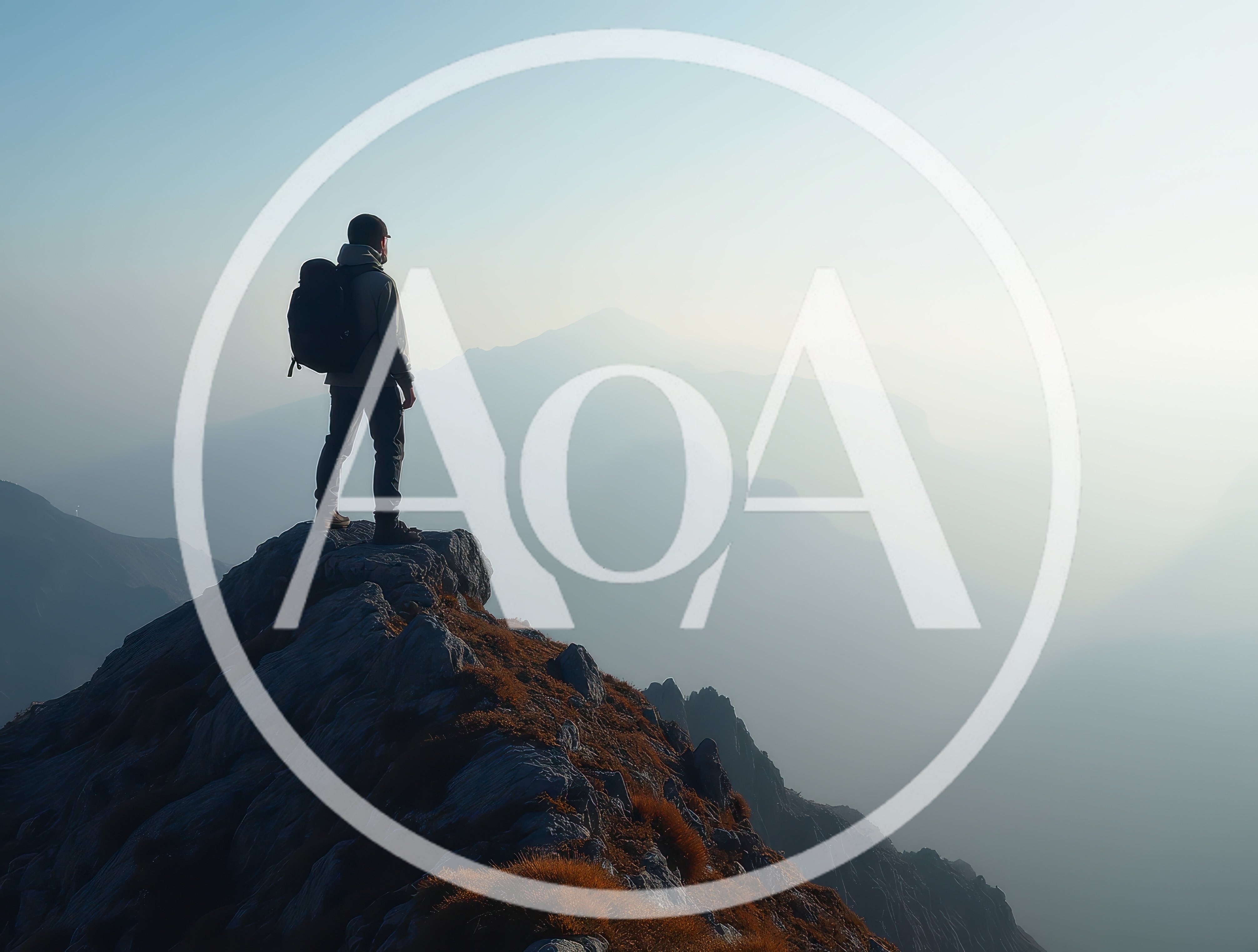 Hiker Standing On A Mountain Peak At Sunrise