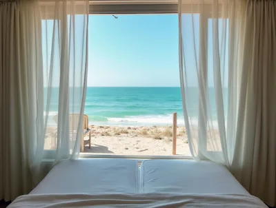 View Of Tropical Beach From Hotel Room Window
