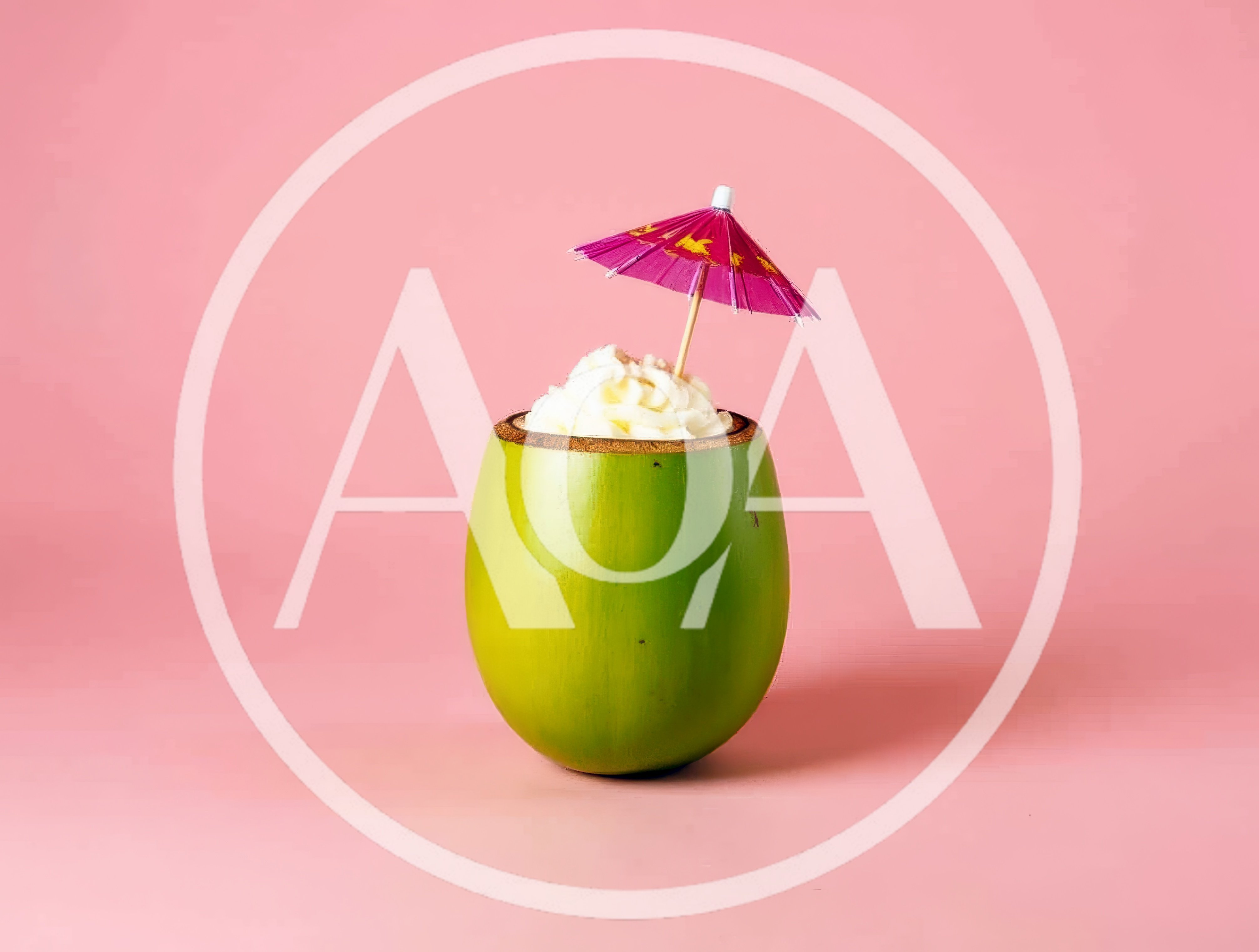 Coconut Cocktail With Whipped Cream And Umbrella