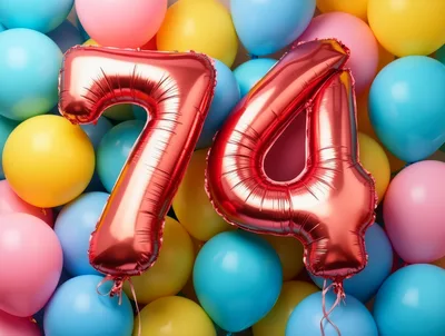 Red Foil Number 74 Balloons Against Colorful Background