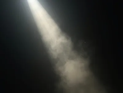 Dramatic Spotlight Beam With Floating Dust Particles