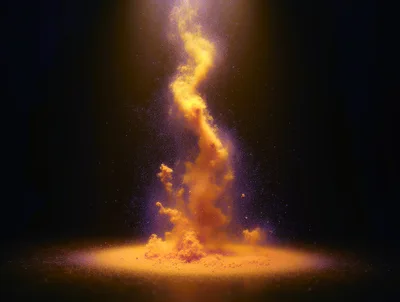 Golden Dust Explosion Rising Against Dark Background