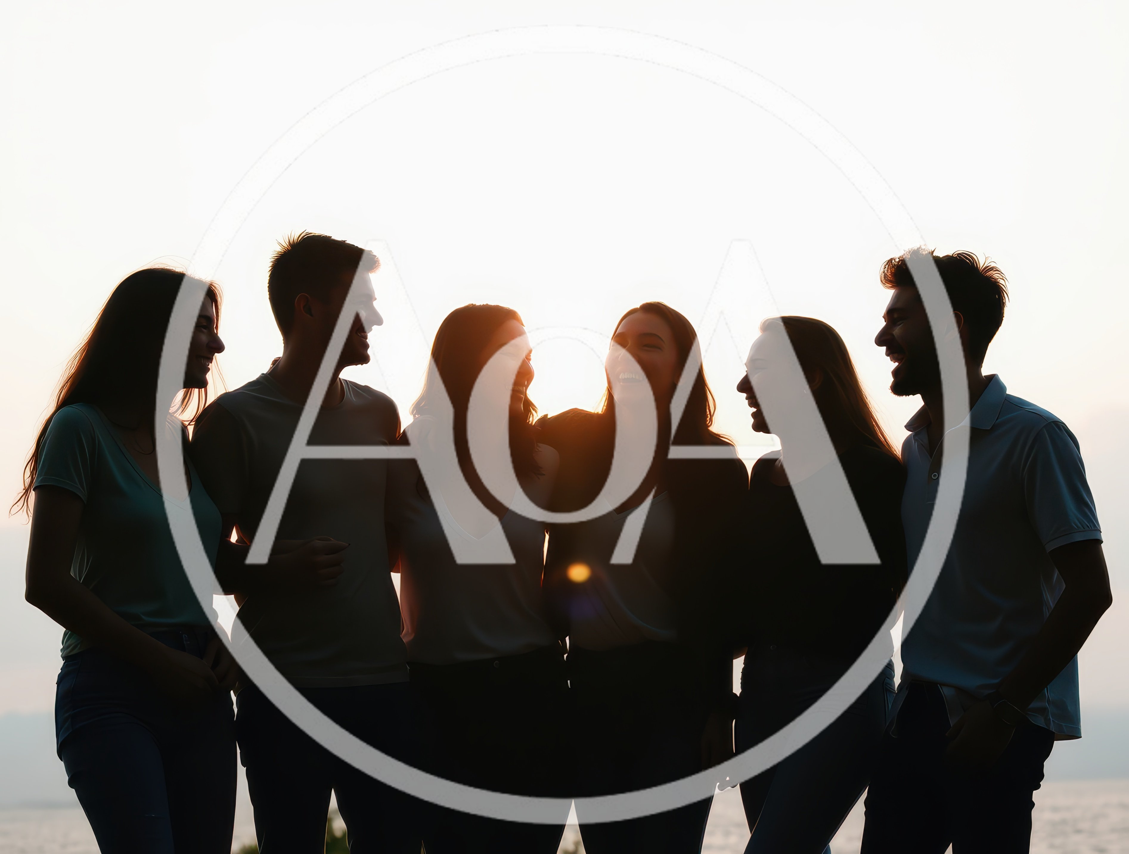 Group Of Friends Laughing Together At Sunset