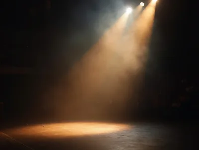 Empty Stage With Dramatic Spotlight Beams