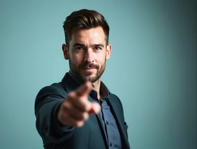 Professional Man Pointing Directly At Camera